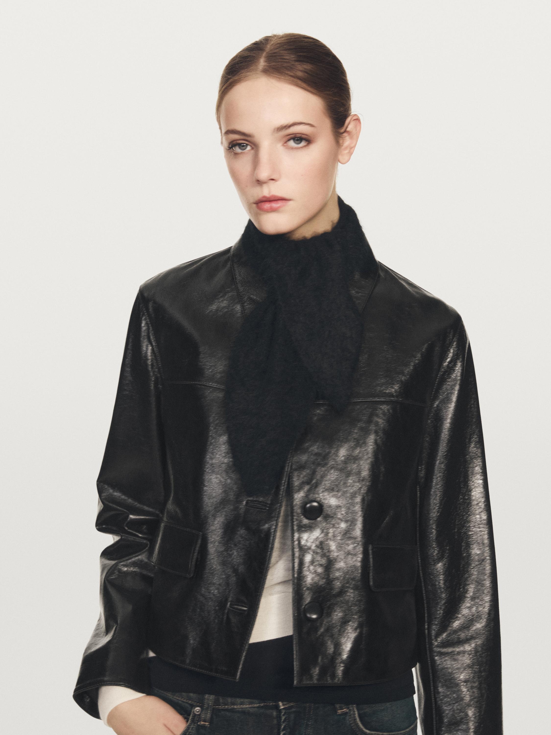 Stickad slips i 100 % kashmir med knytning