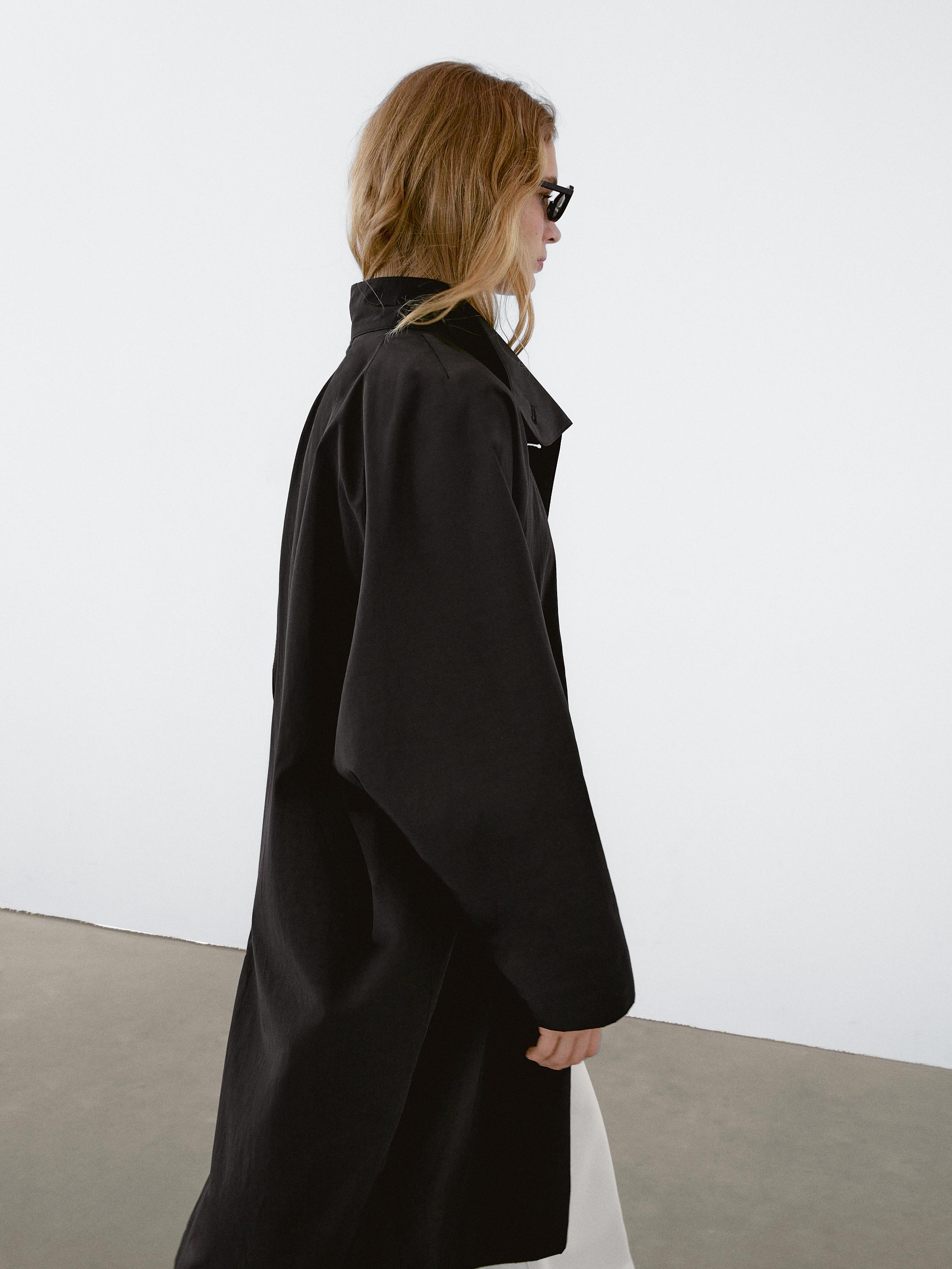 Oversize flowing trench coat in water-repellent fabric