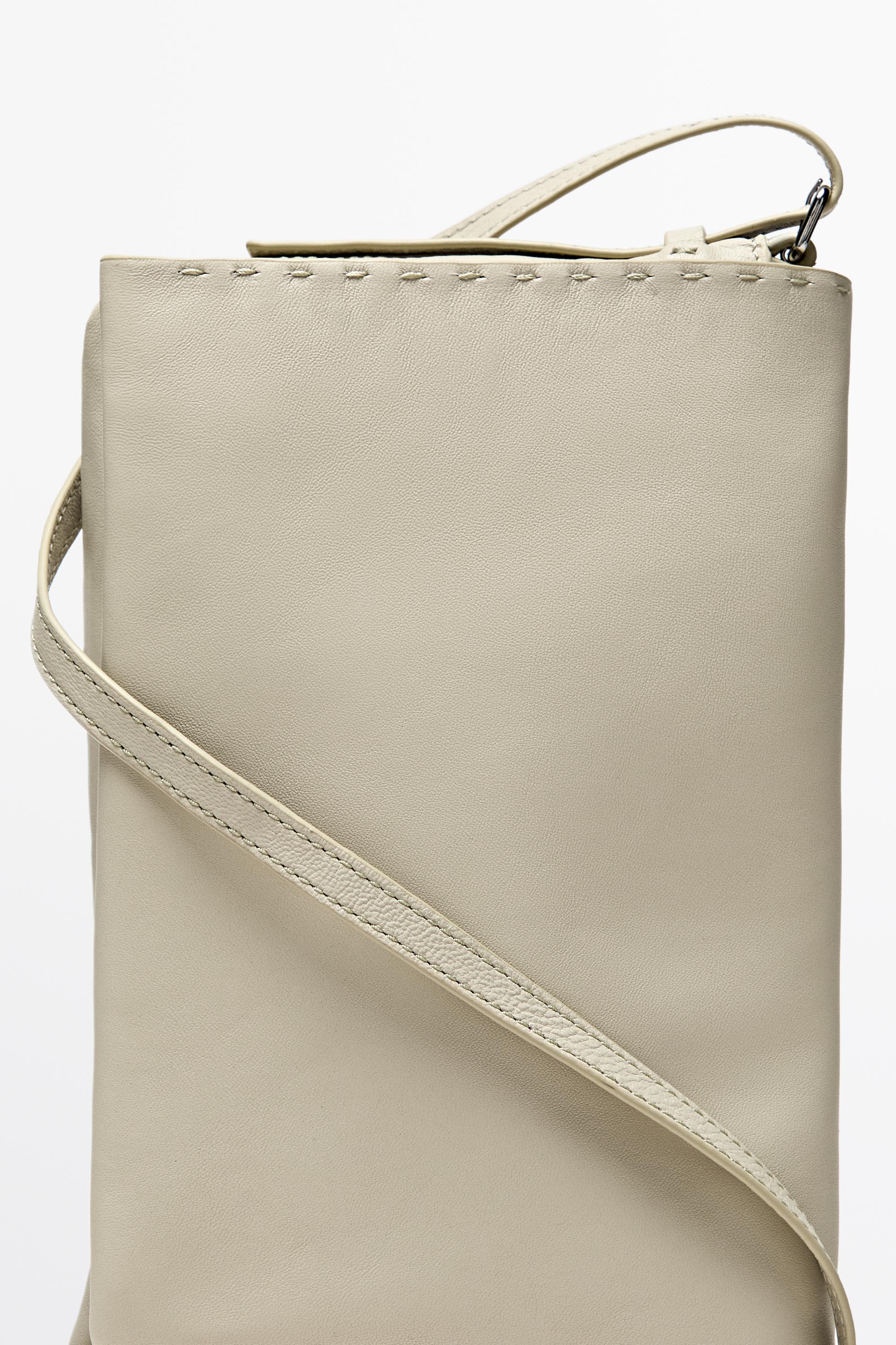 Nappa leather crossbody bag with topstitching — Gold