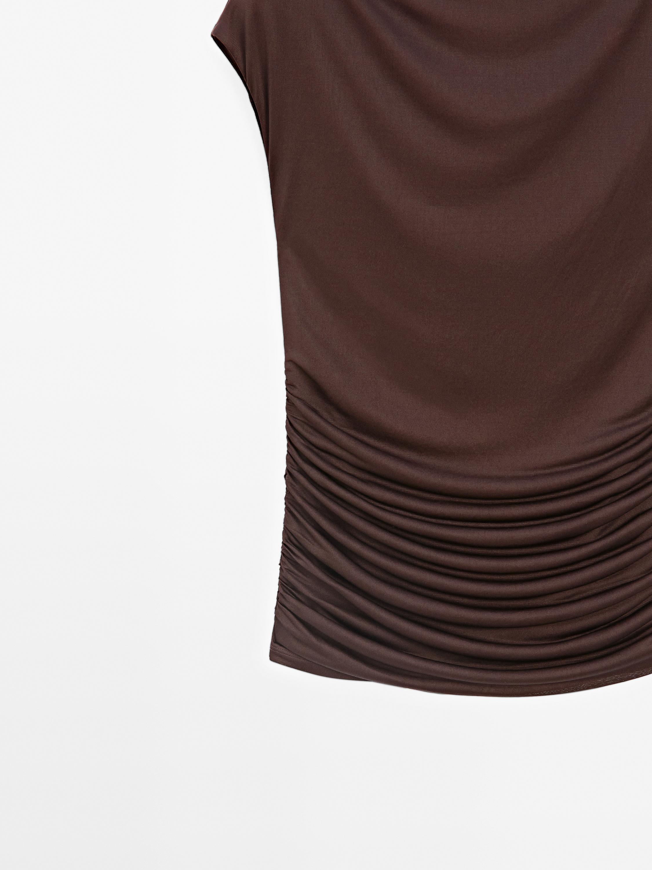 Top with draped detail