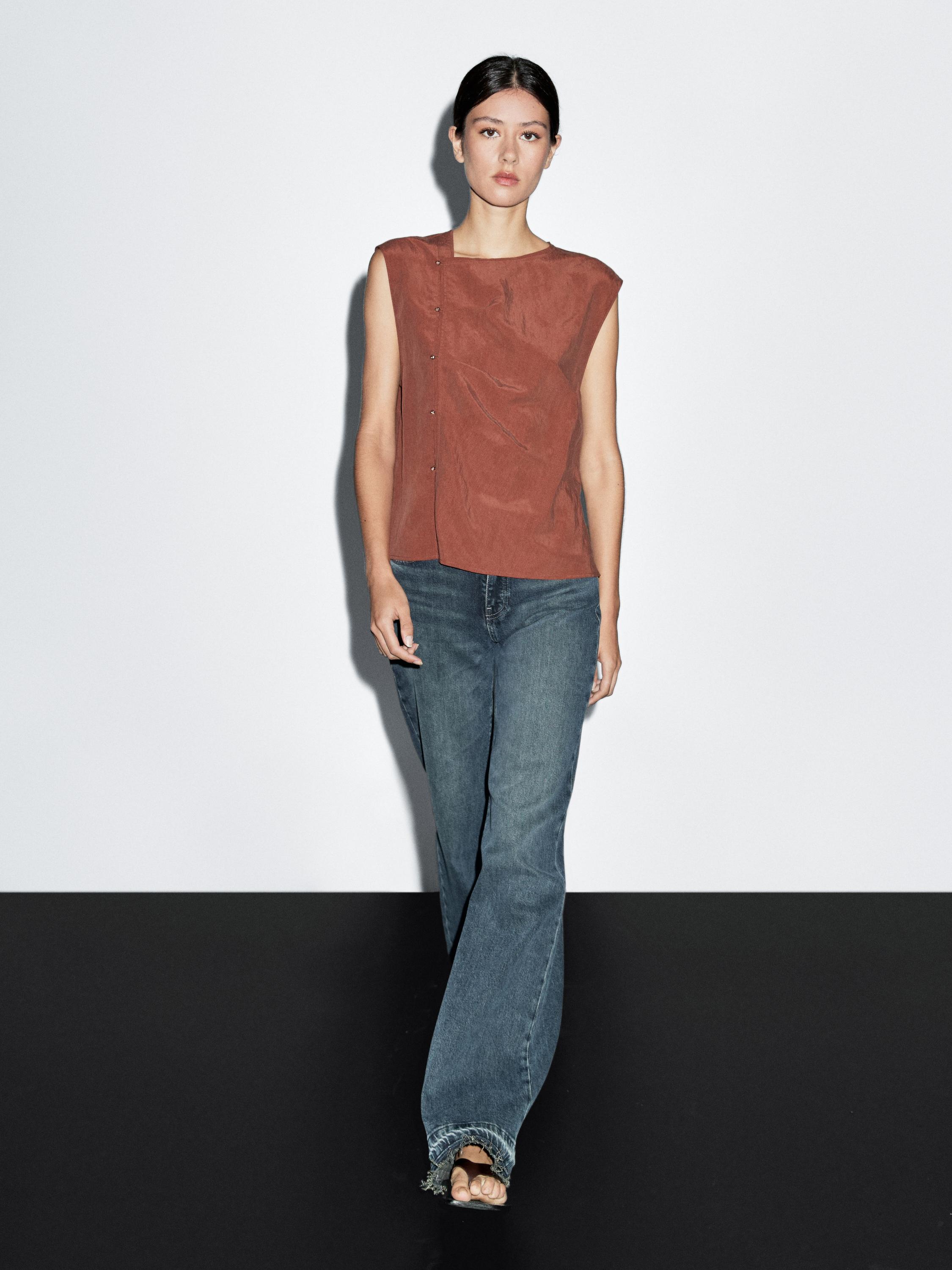 Blouse boutonnage côté argenté