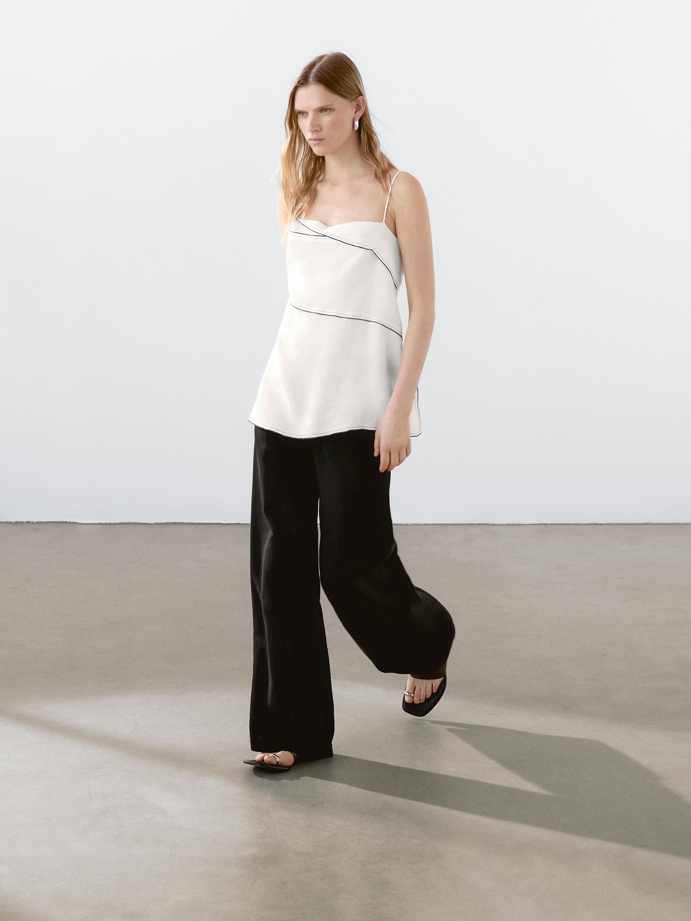 Flowing top with topstitching detail