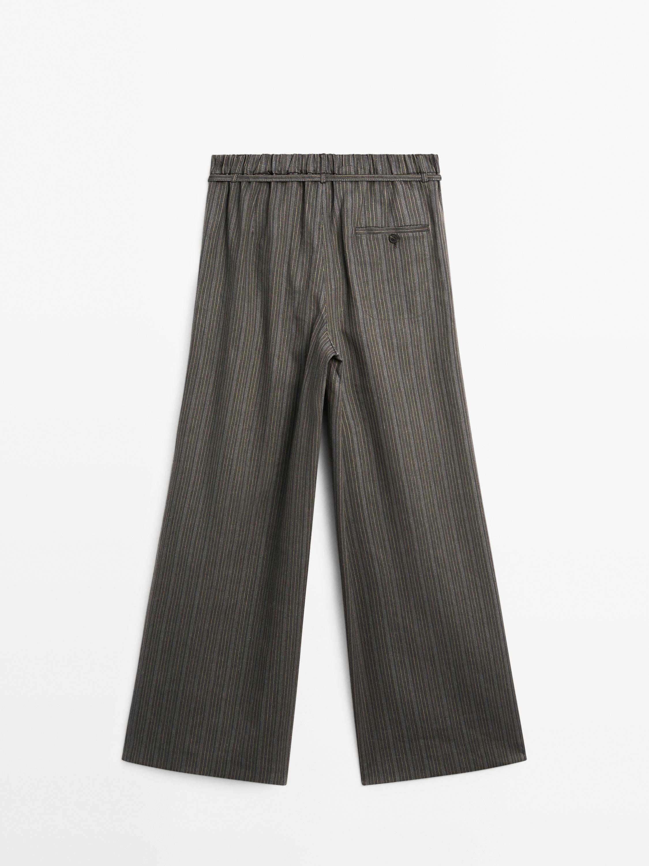 Multi-stripe trousers with belt detail