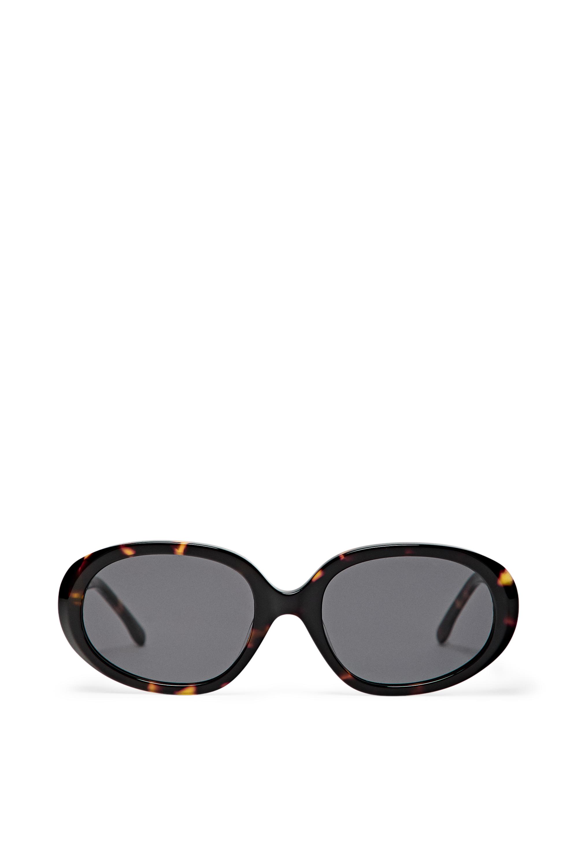 Oval tortoiseshell-effect sunglasses — BROWN