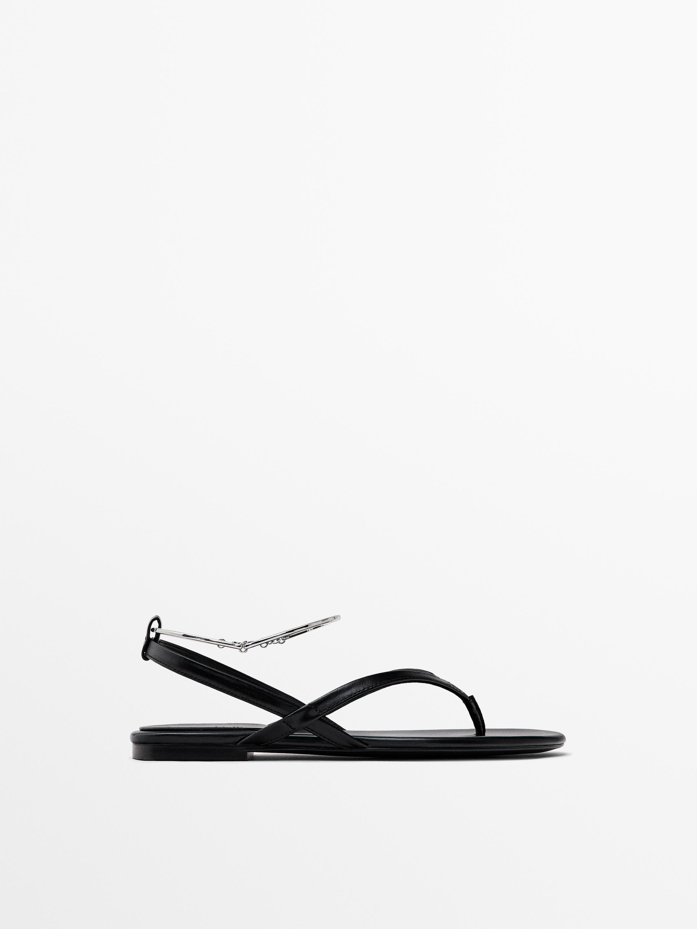 Flat sandals with ankle strap