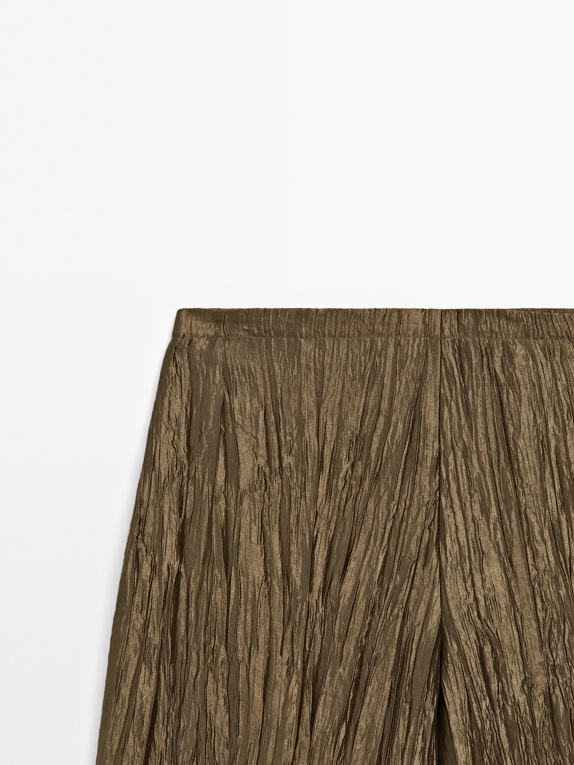 Pantalon tissu métallisé