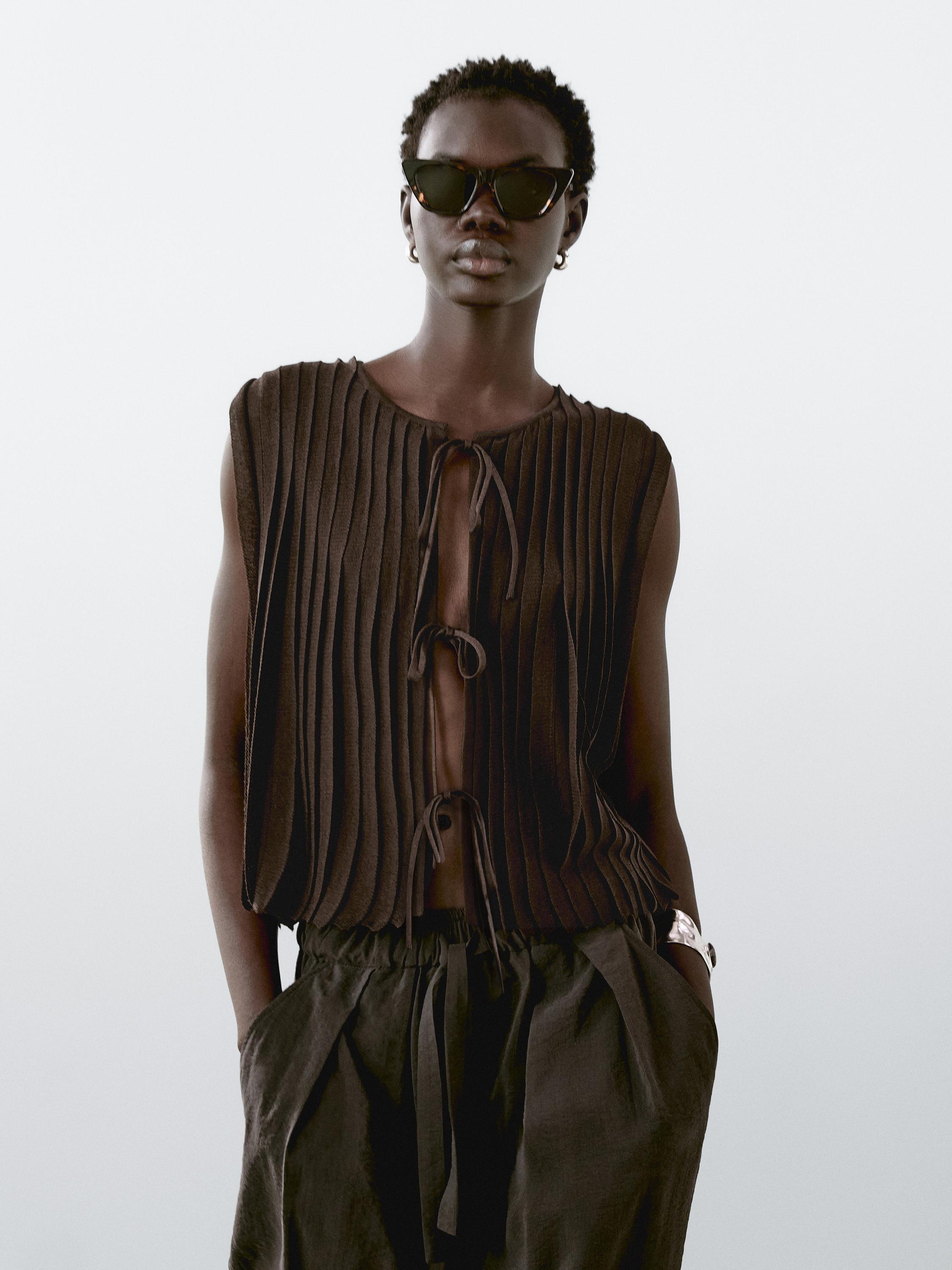 Waistcoat with tie and pleated detail