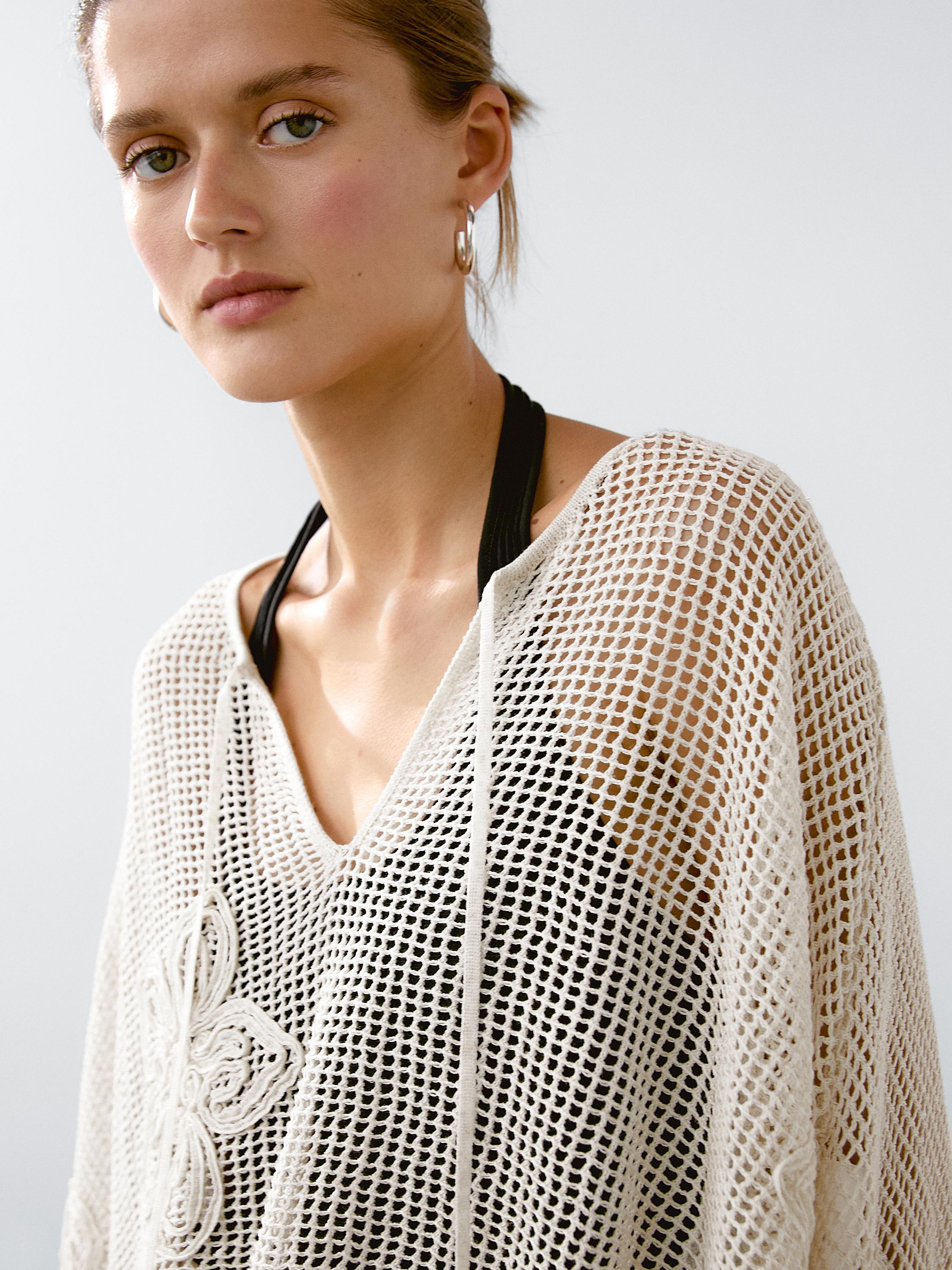 Embroidered cutwork cape