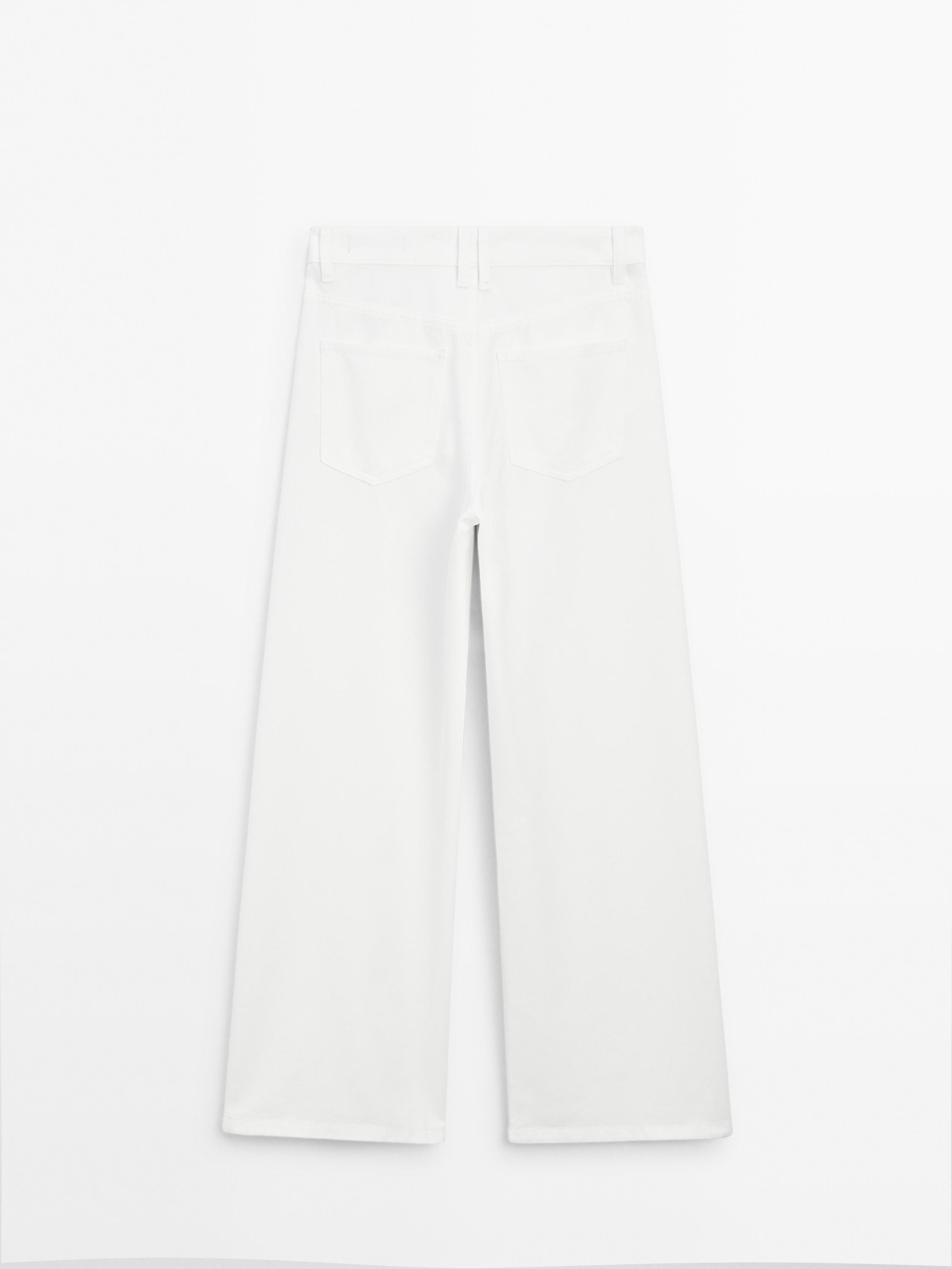 High-waist wide-leg jeans with seam details