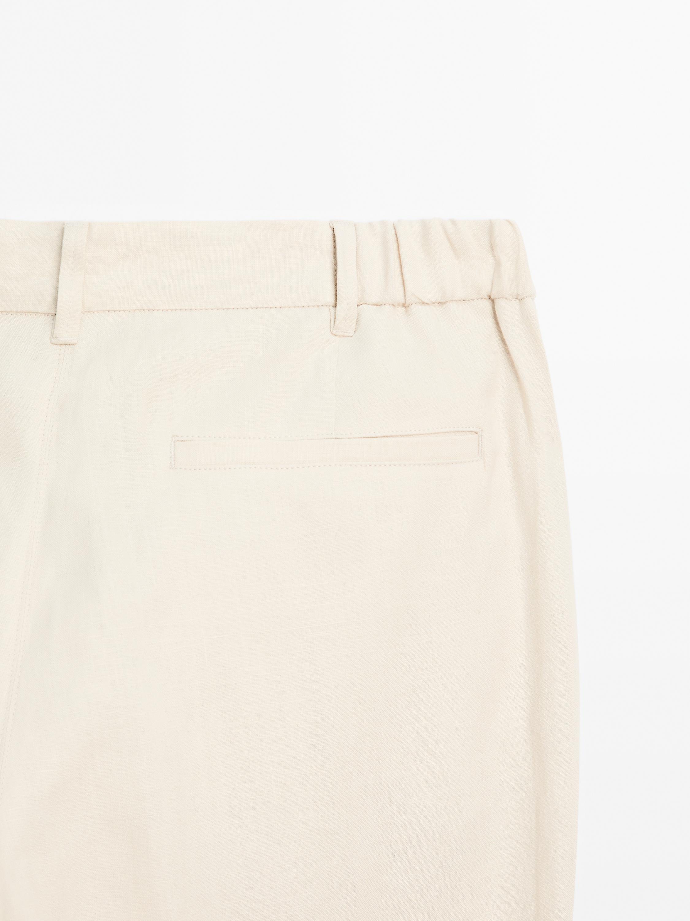 100% linen tapered fit trousers