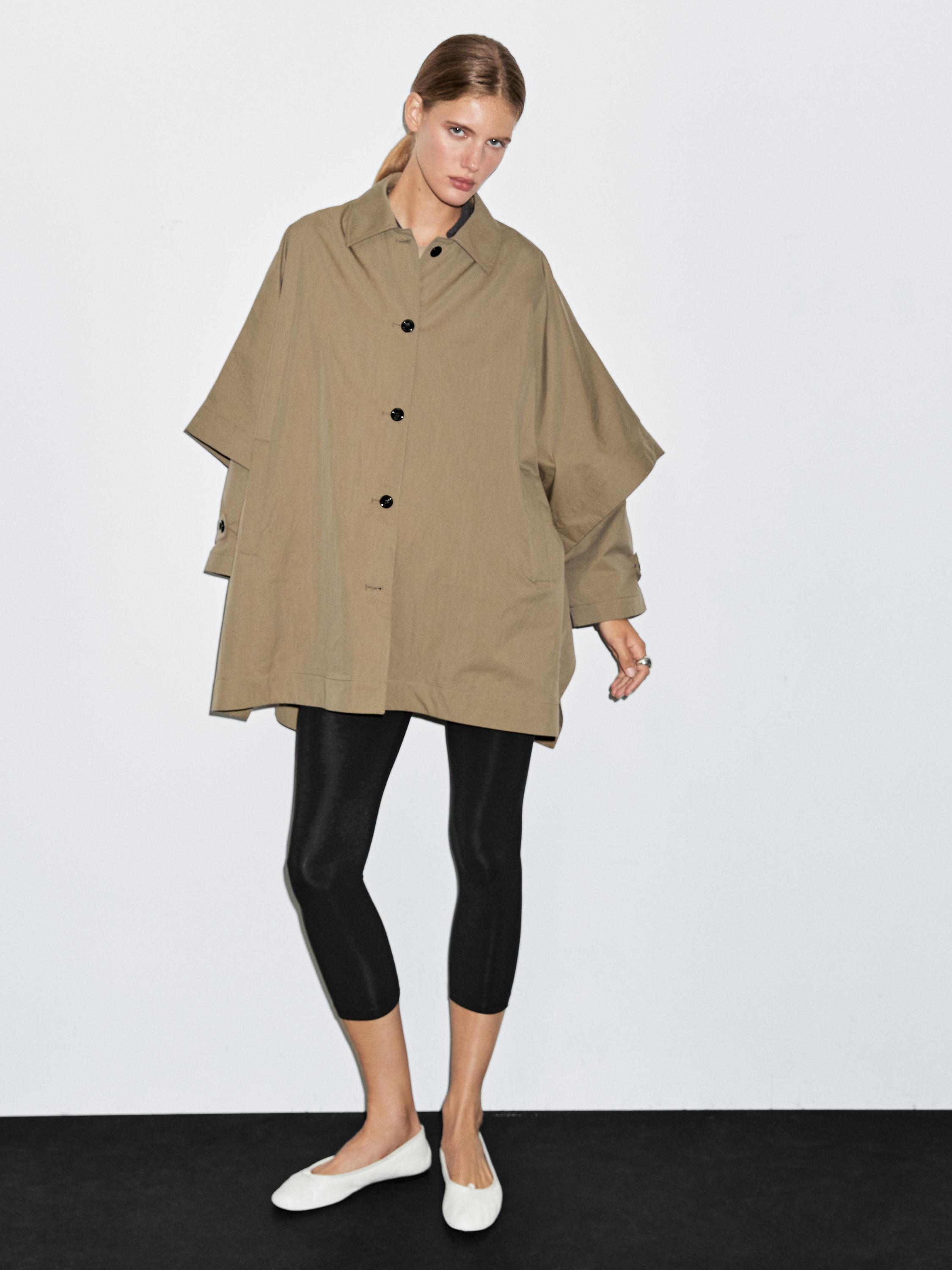 Cape trench coat with long sleeves