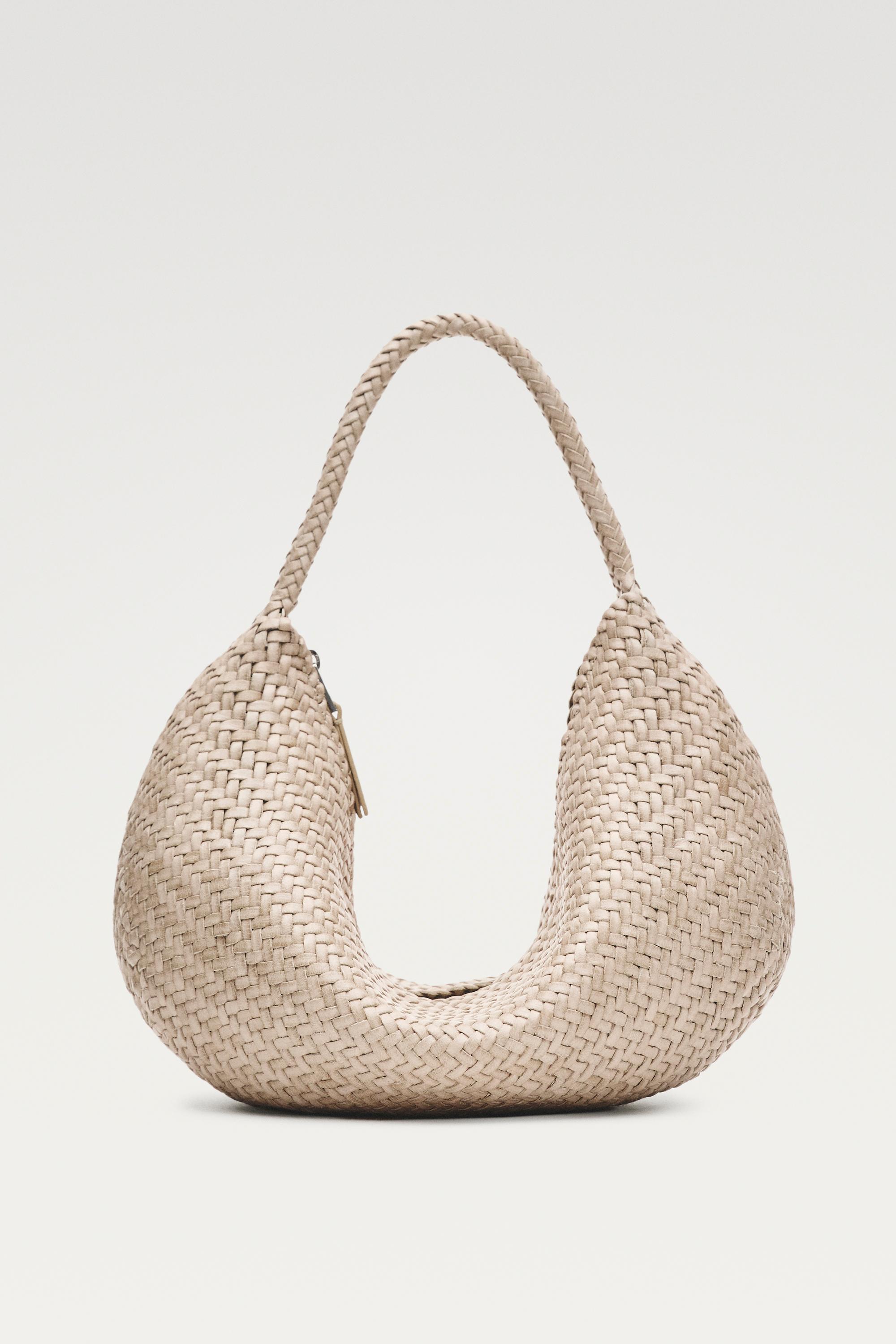 Braided leather half-moon bag — CREAM