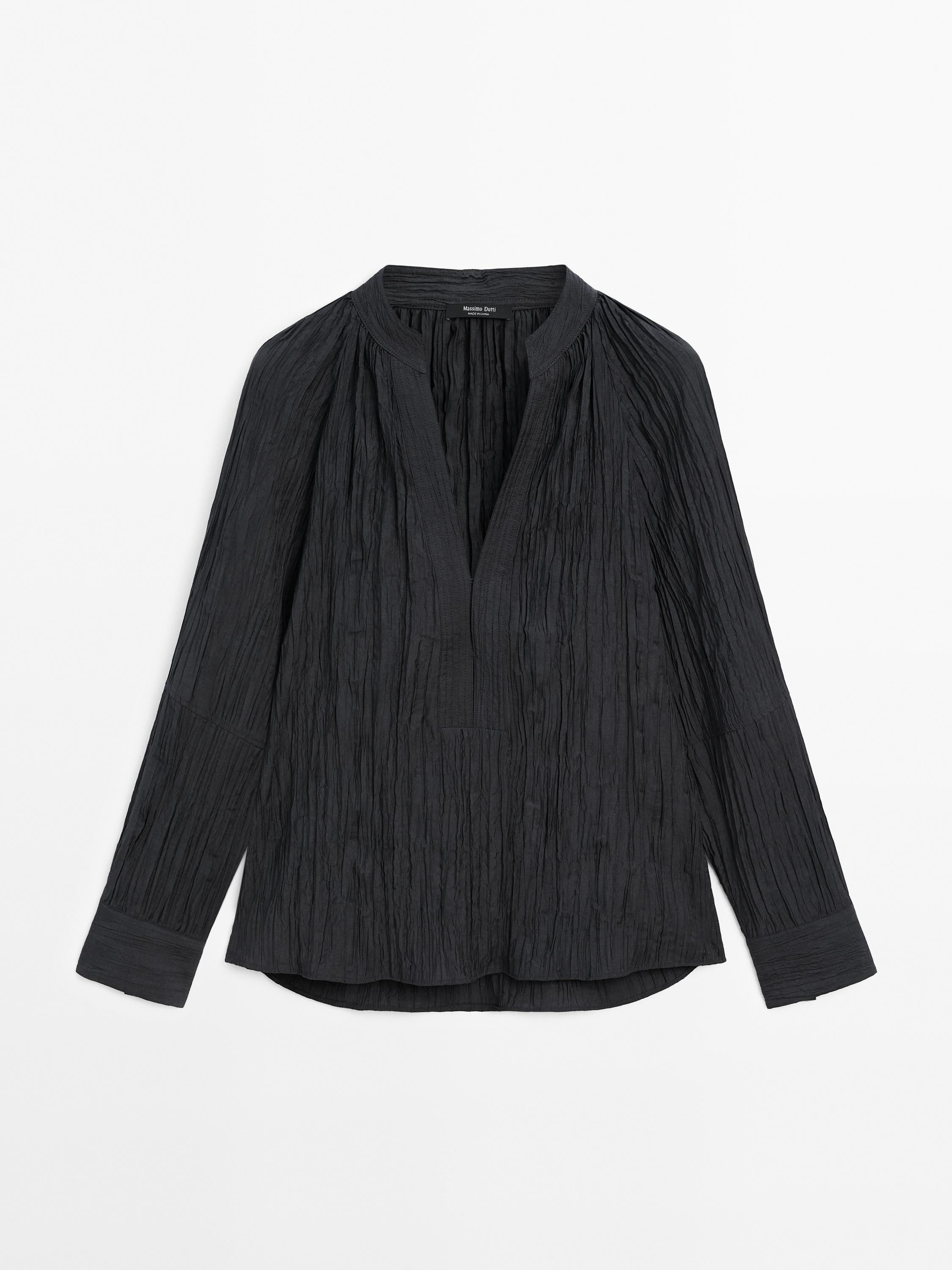 Kemeja pleated jatuh