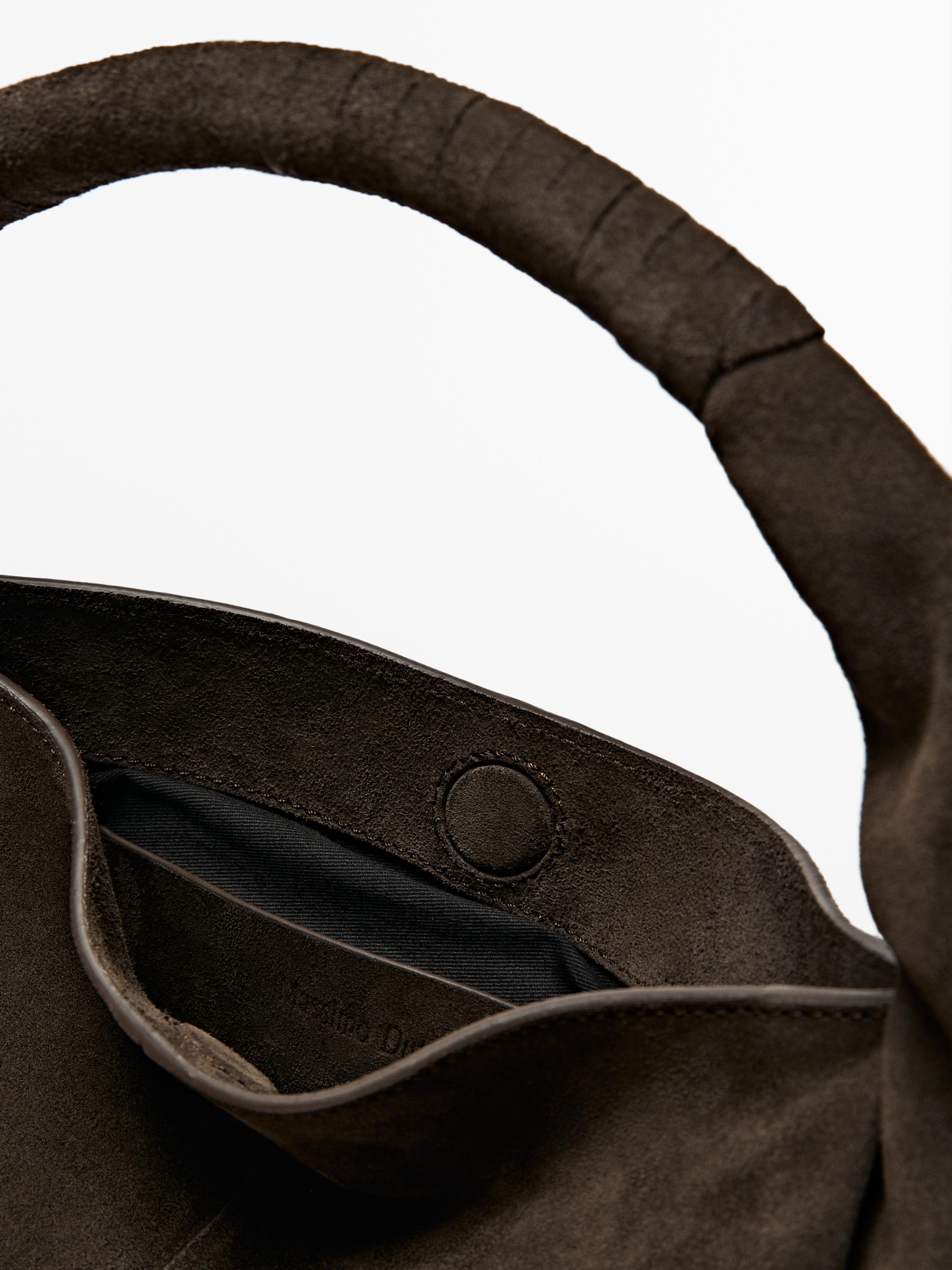 Split suede handbag
