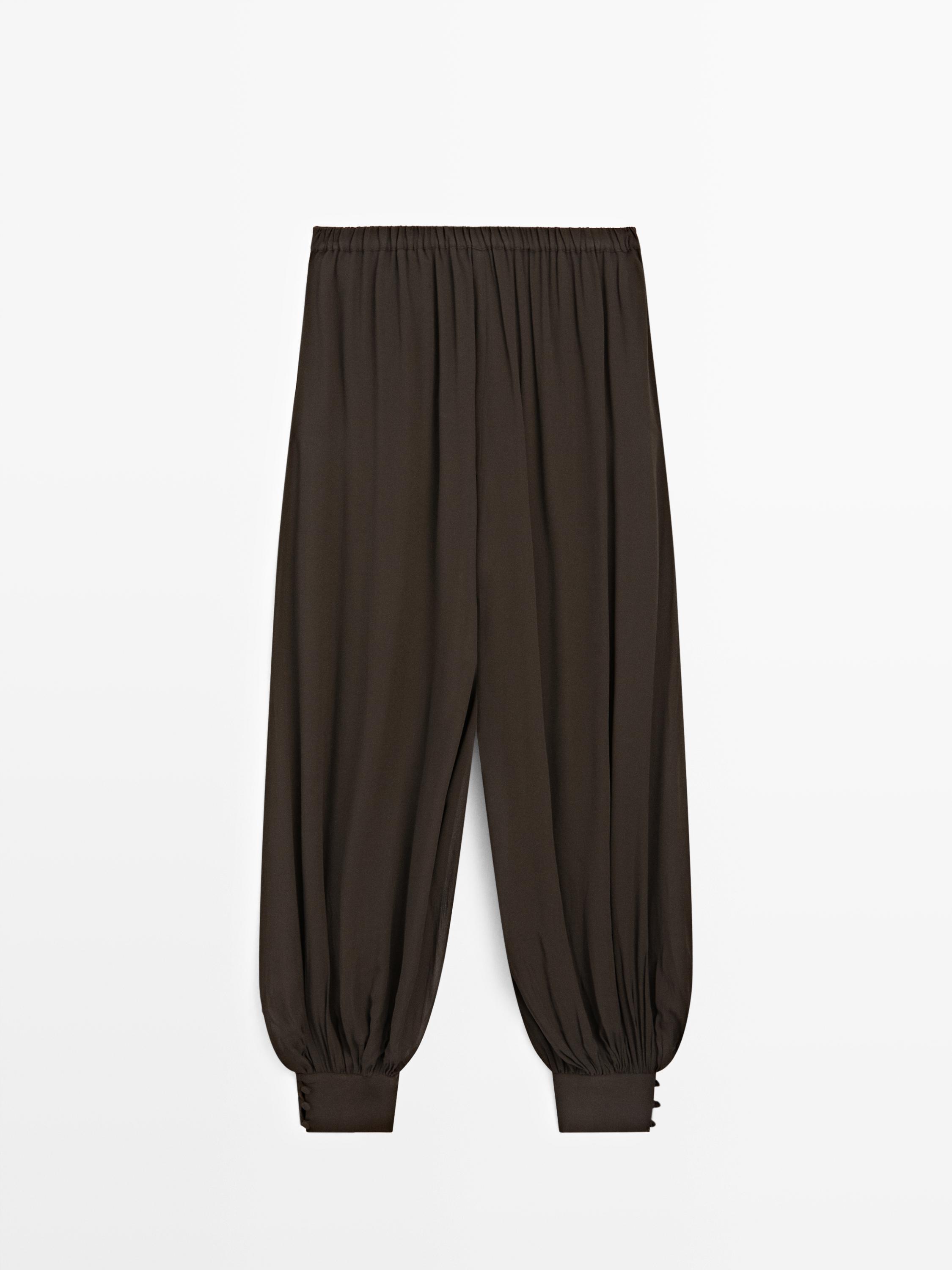 Yarı transparan düğme detaylı şalvar pantolon