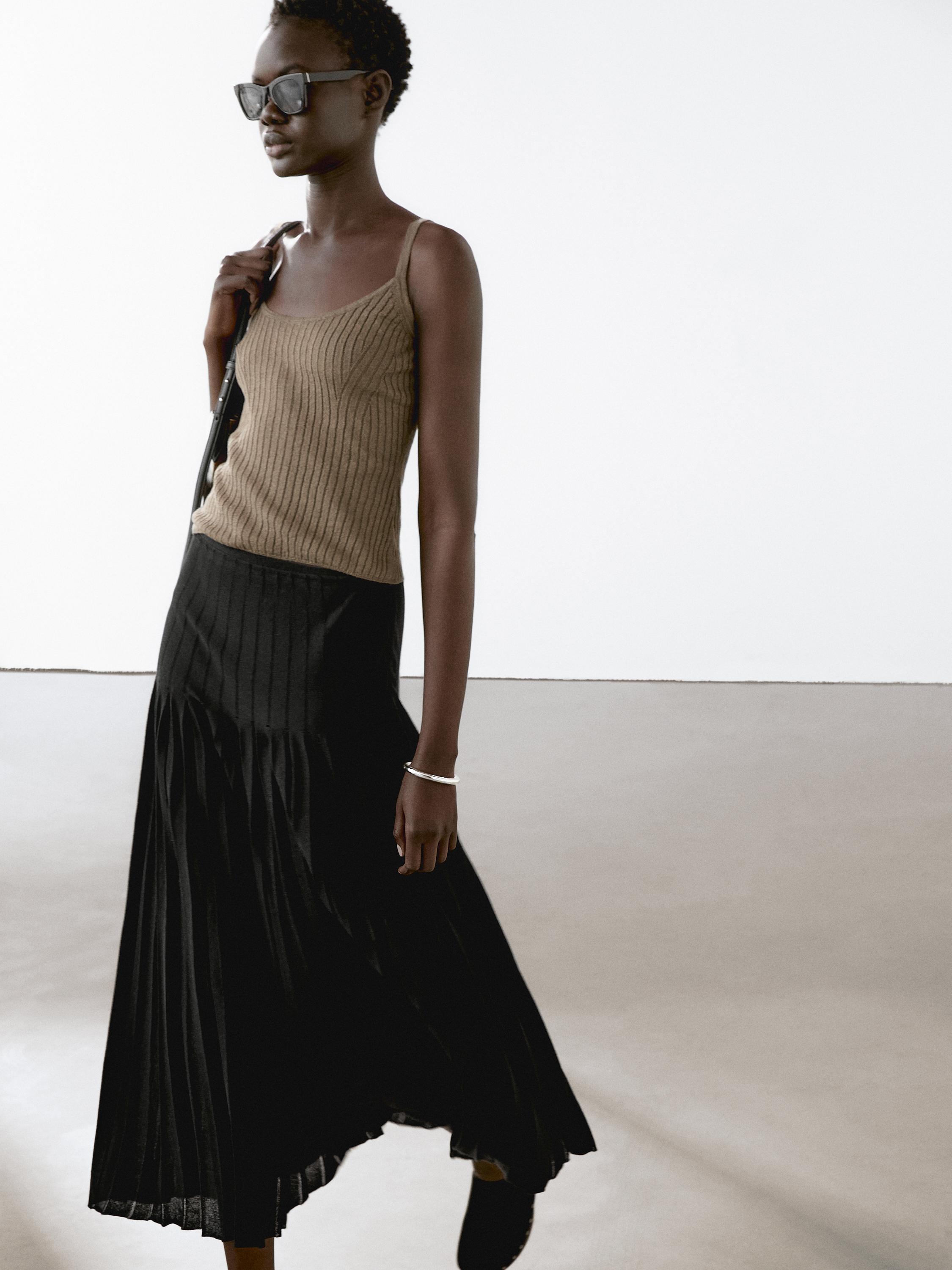 Top punto tirantes detalle rib