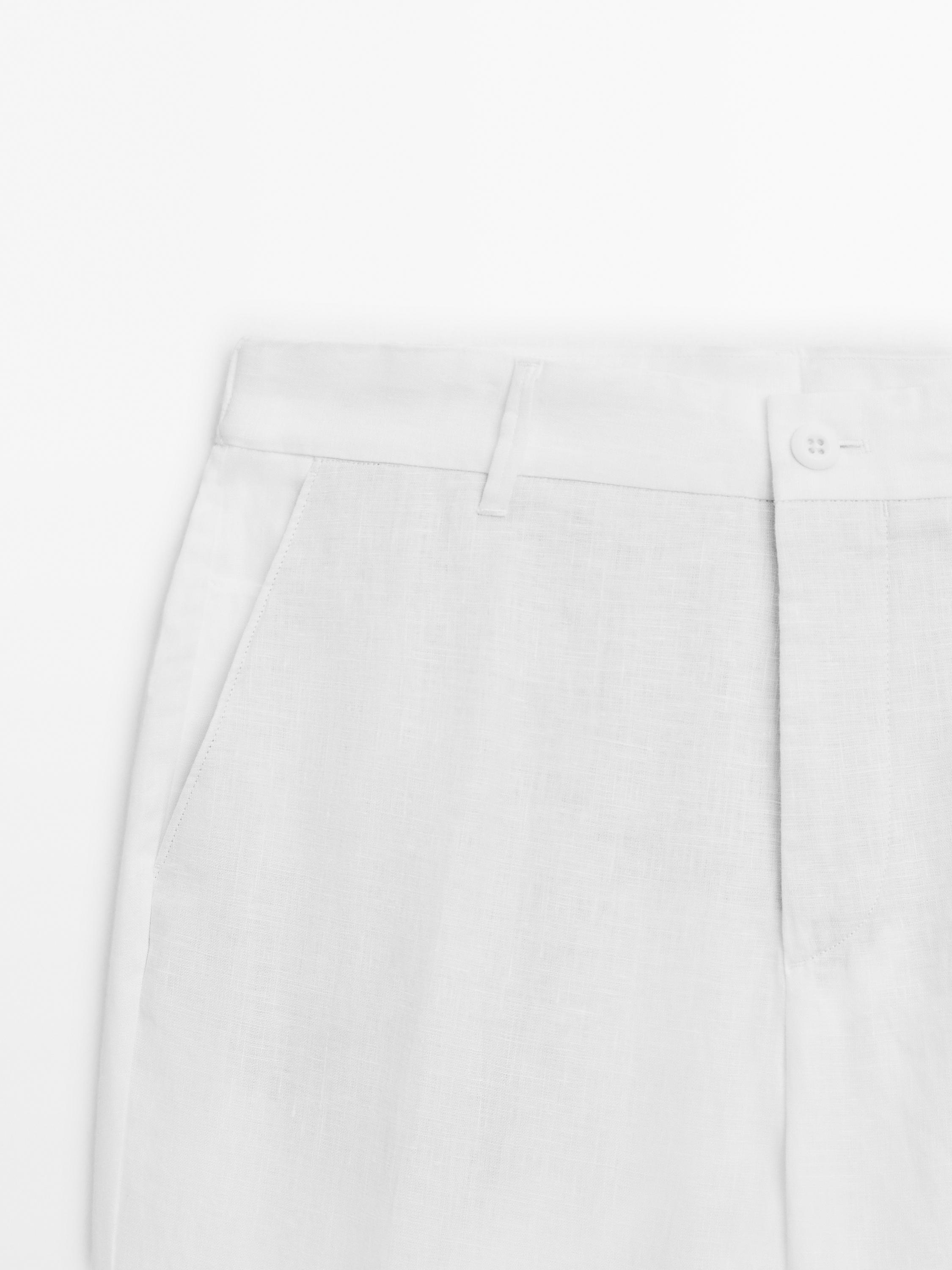 Pantalón tapered fit 100% lino