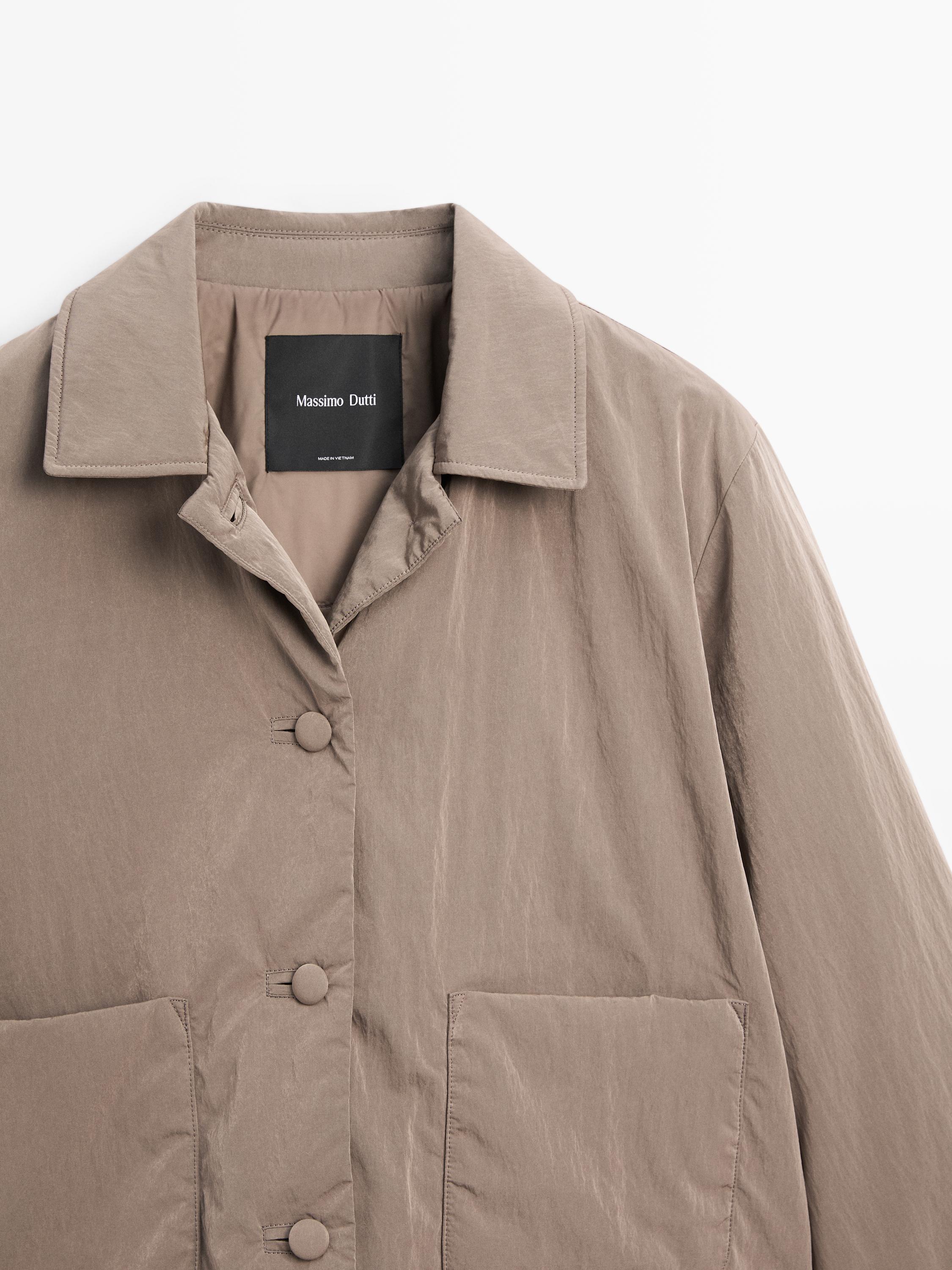 Cropped puffer jacket with covered buttons
