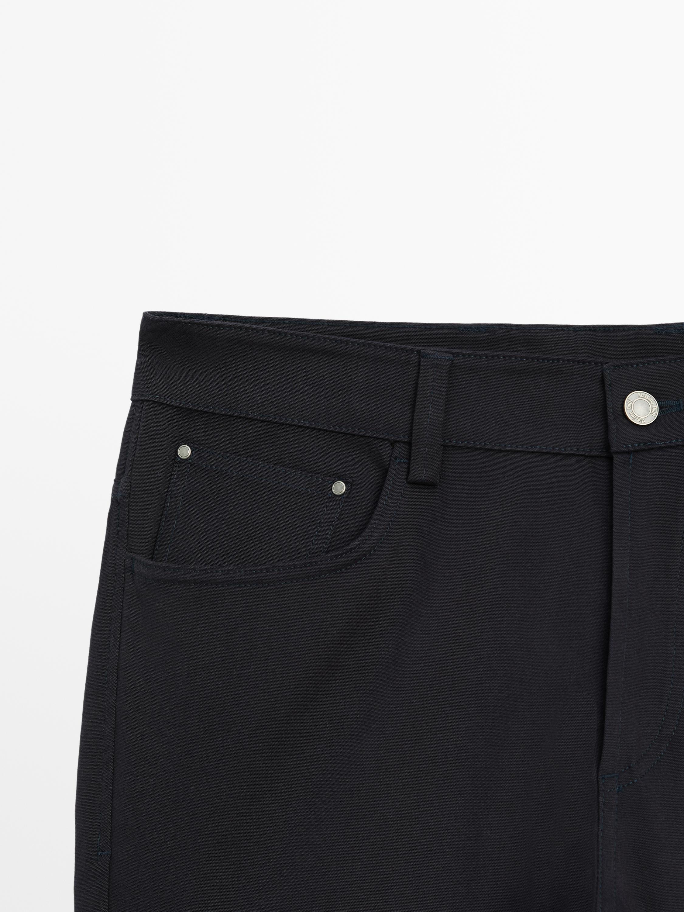 Cotton blend tapered fit jeans