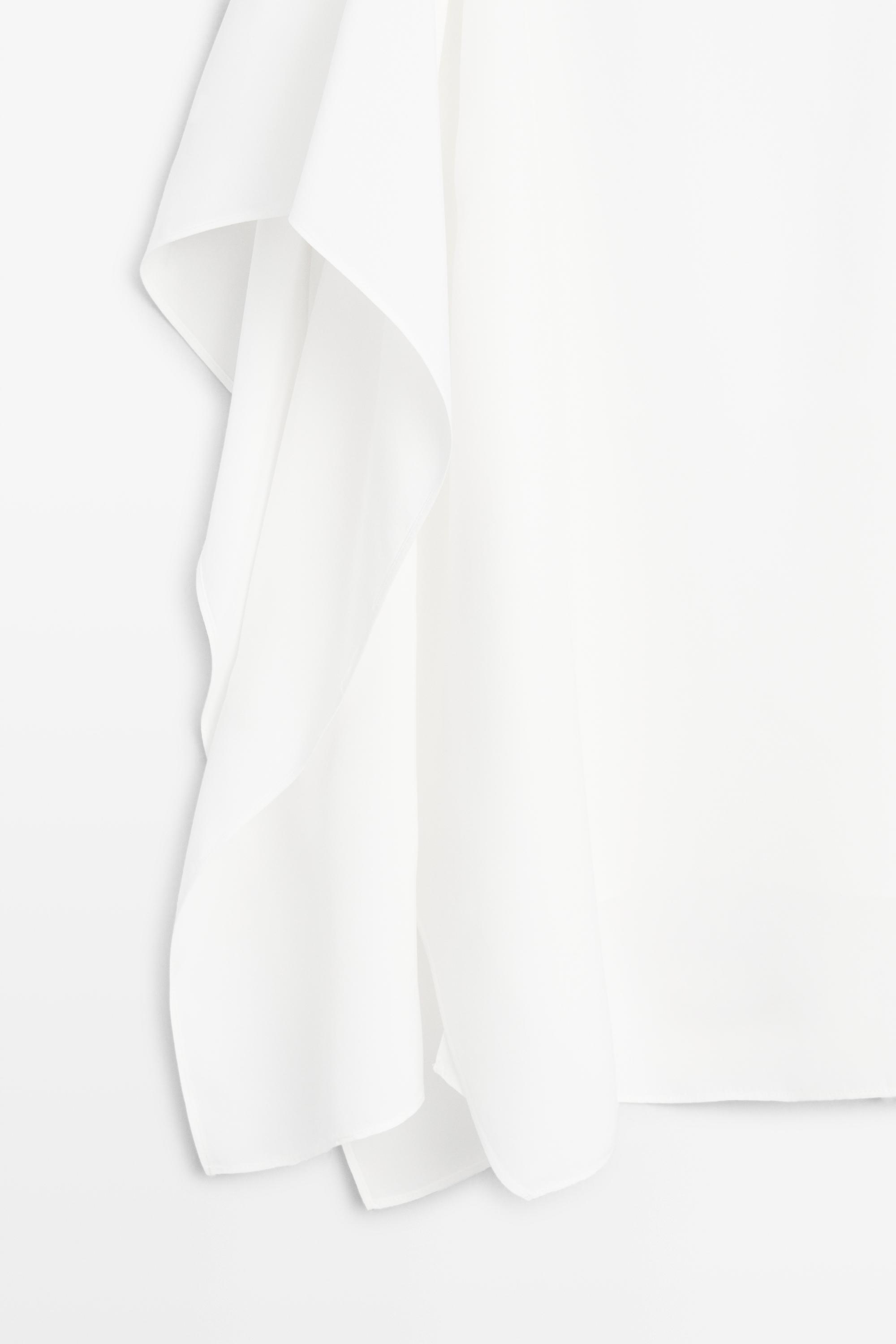 Flowing spaghetti strap top — WHITE