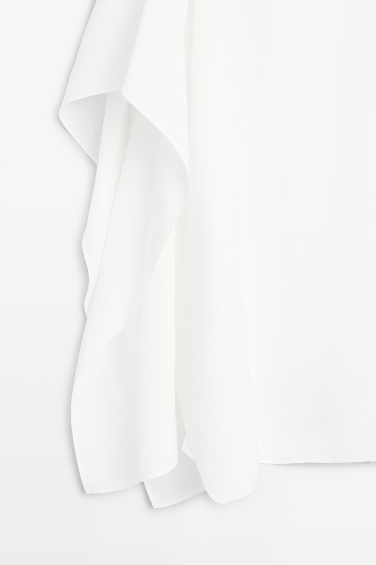 Flowing spaghetti strap top — WHITE