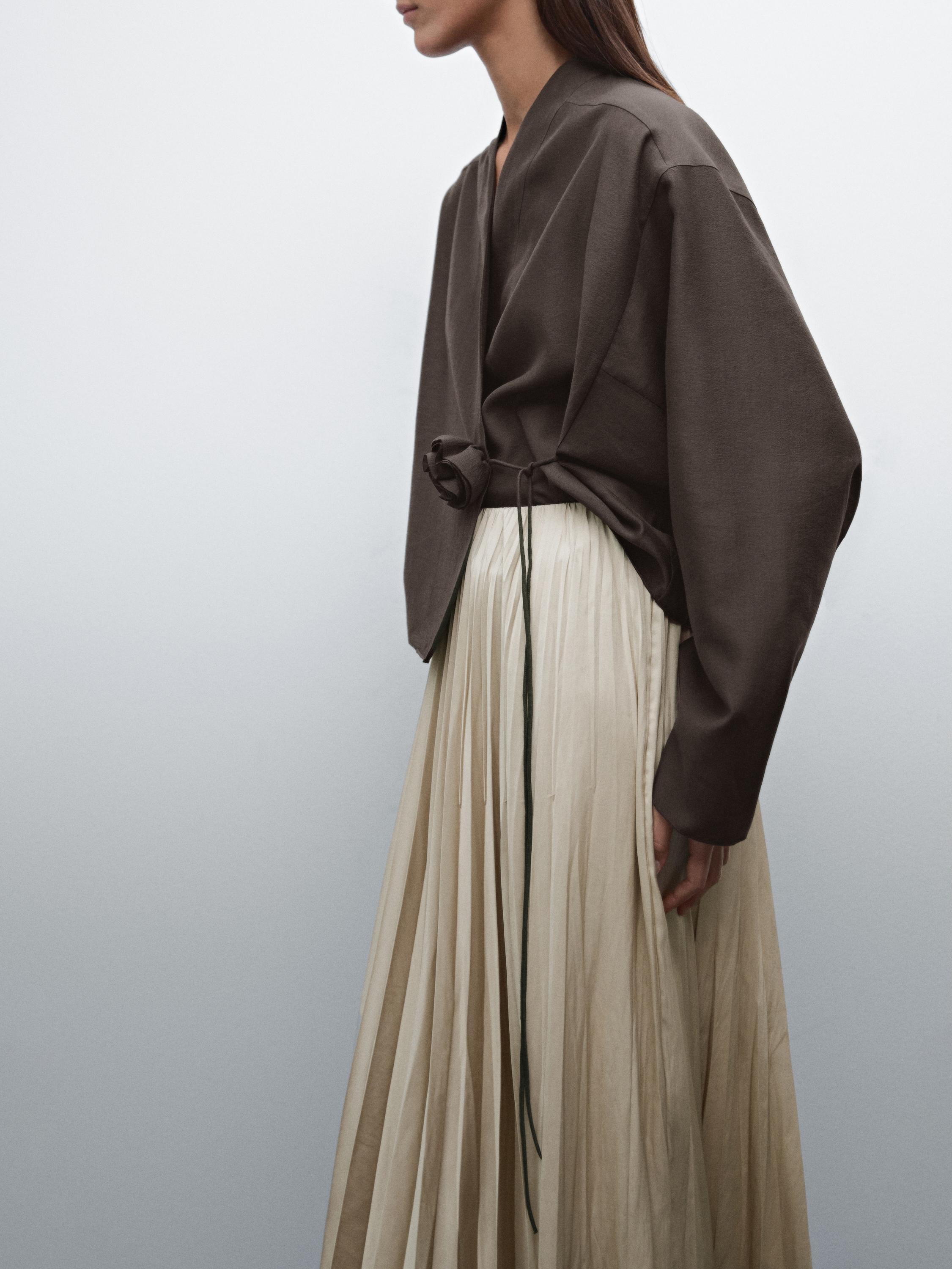 Flowing pleated satin skirt