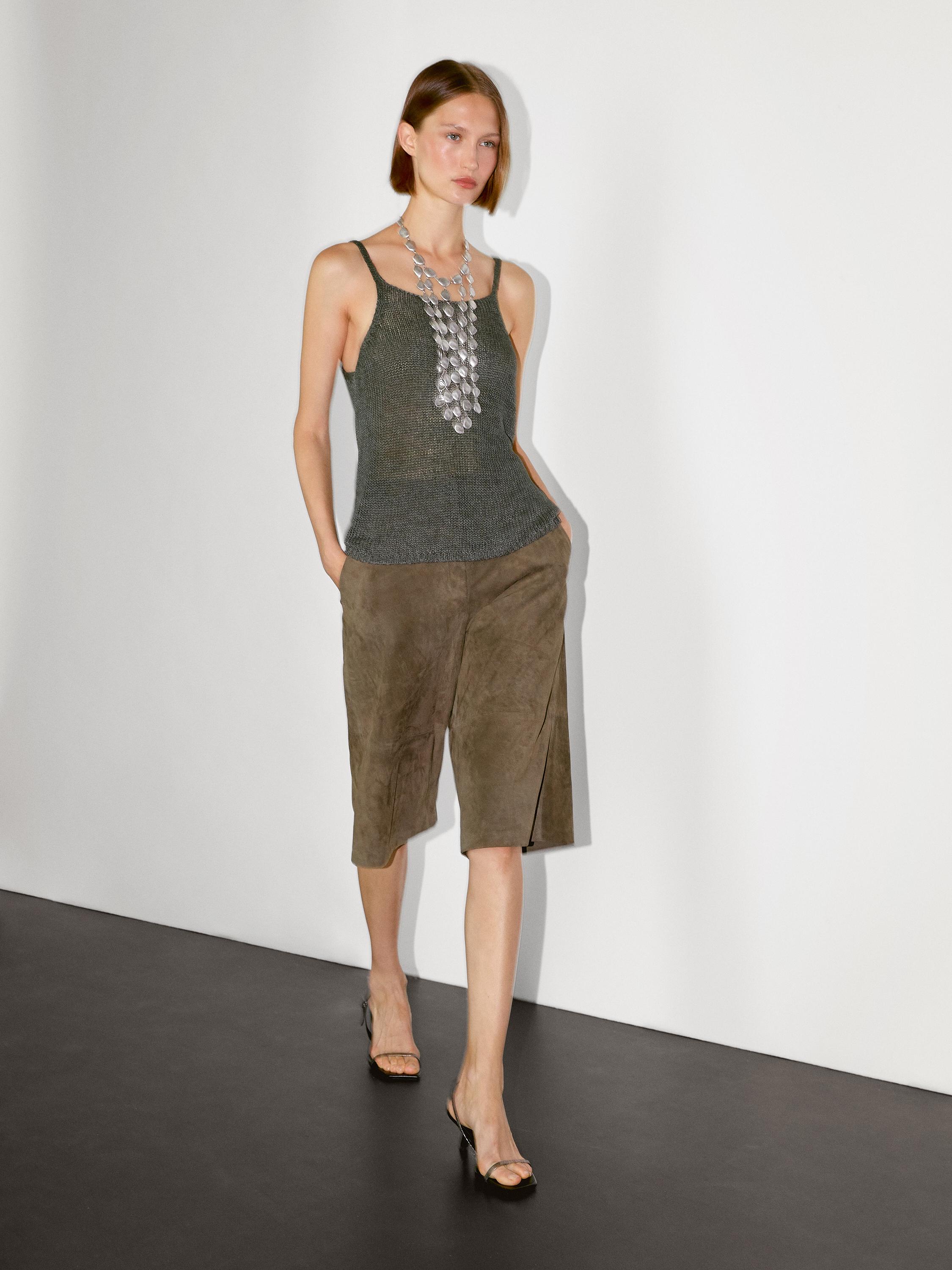Top in maglia con spalline délavé