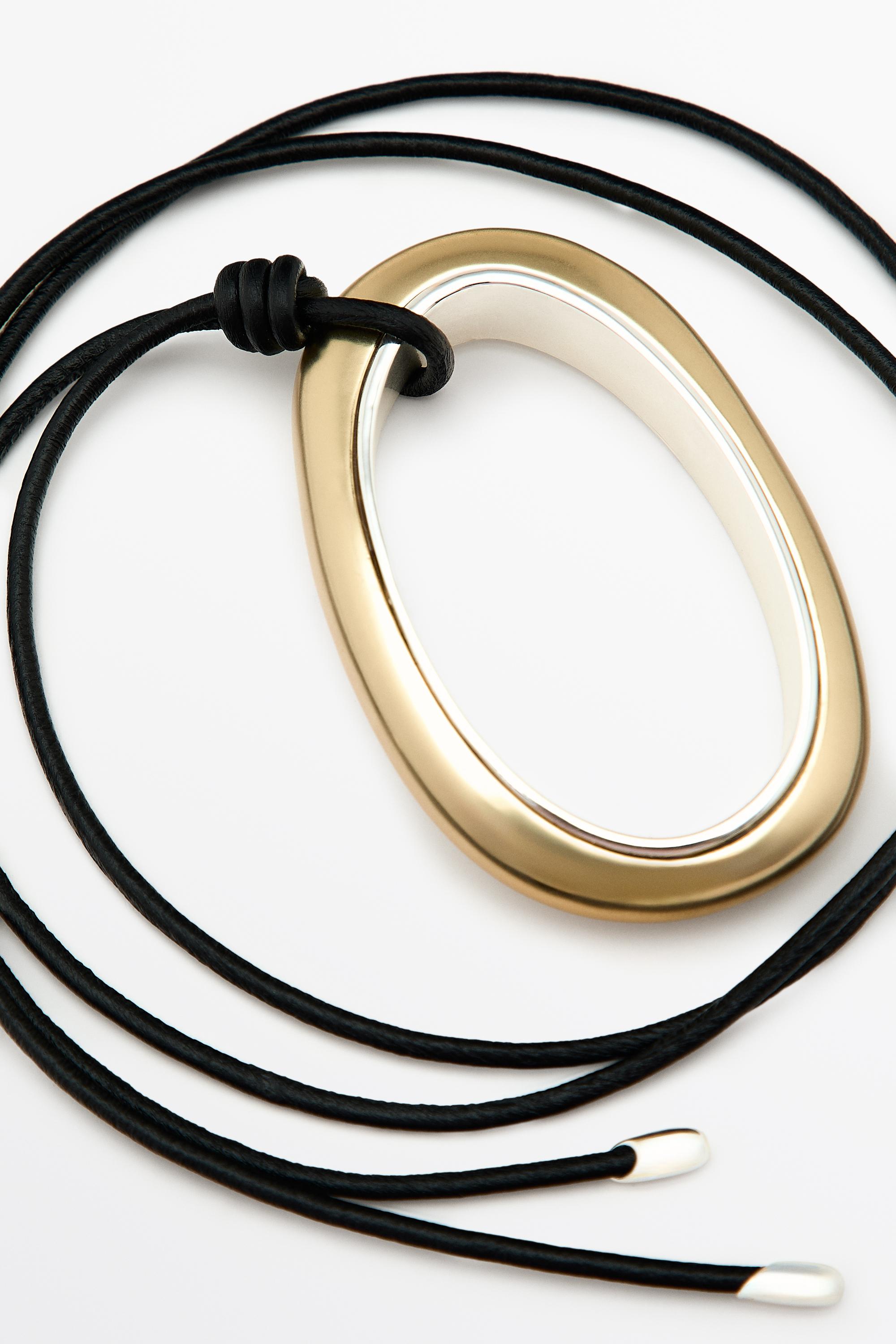 Leather cord necklace with oval pendant — GOLDEN