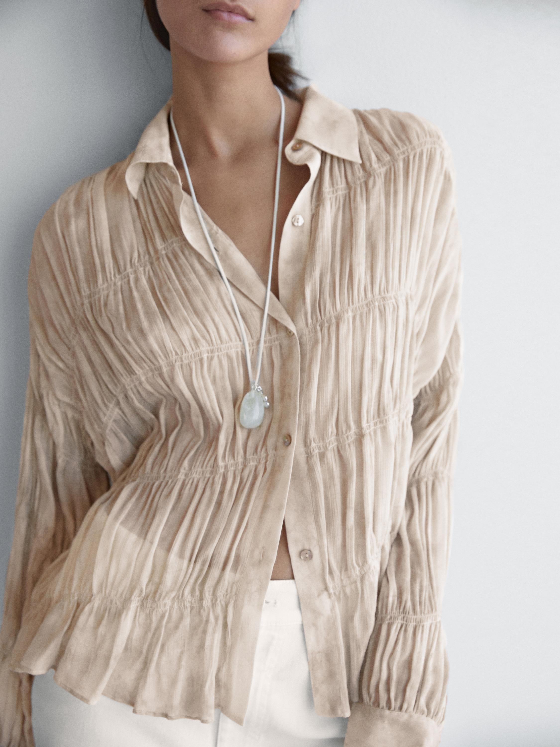 Flowing shirt with gathered details