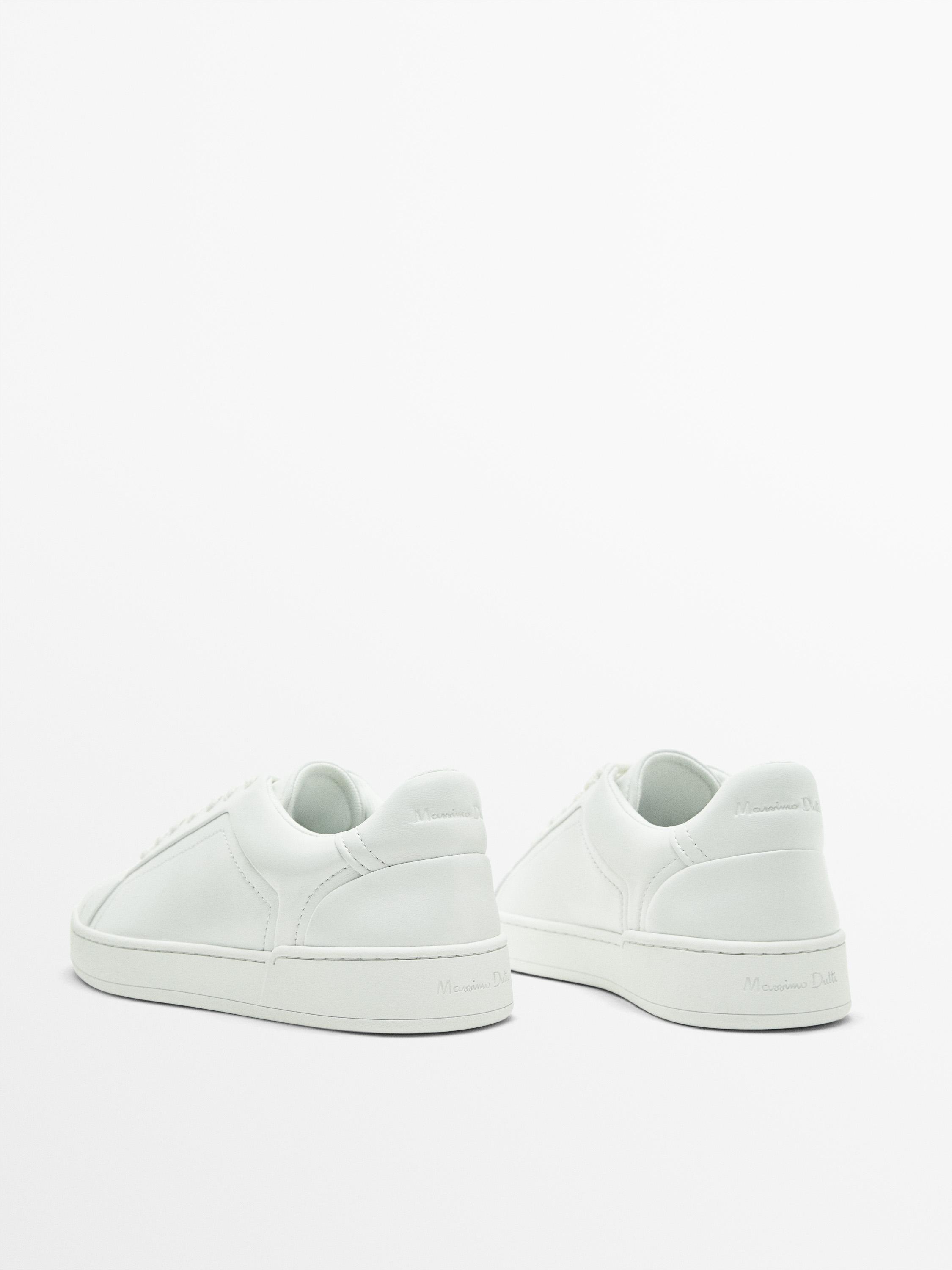 White leather trainers