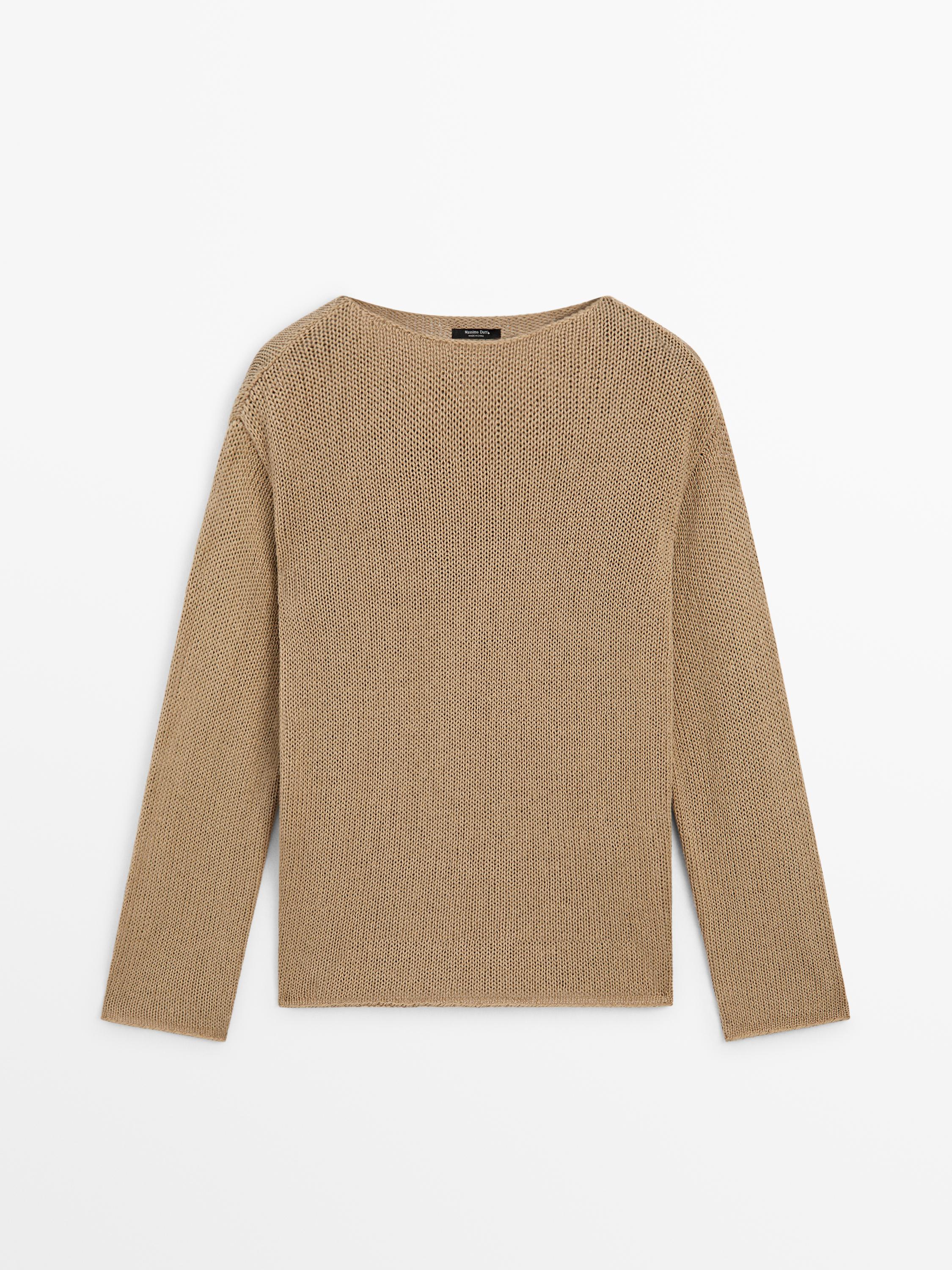 Vista frontal de jersey tricotado color lavado con cuello redondo y mangas largas.