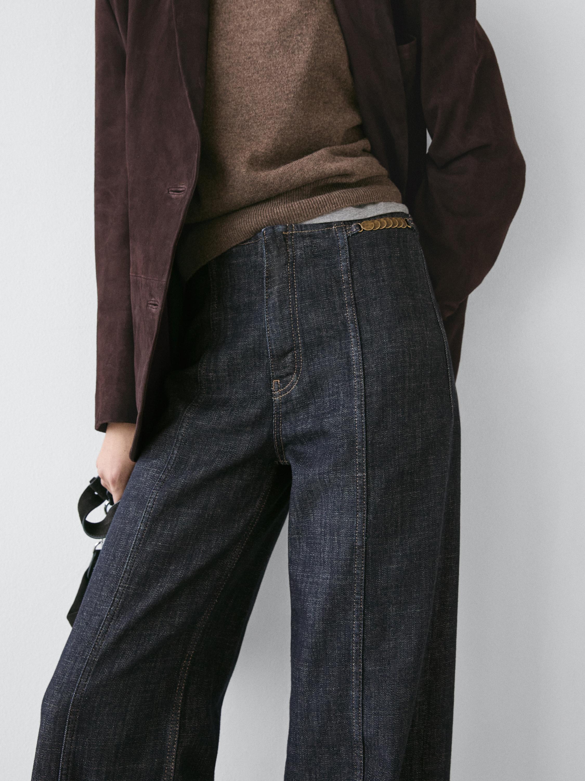 High-waist wide-leg jeans with chains