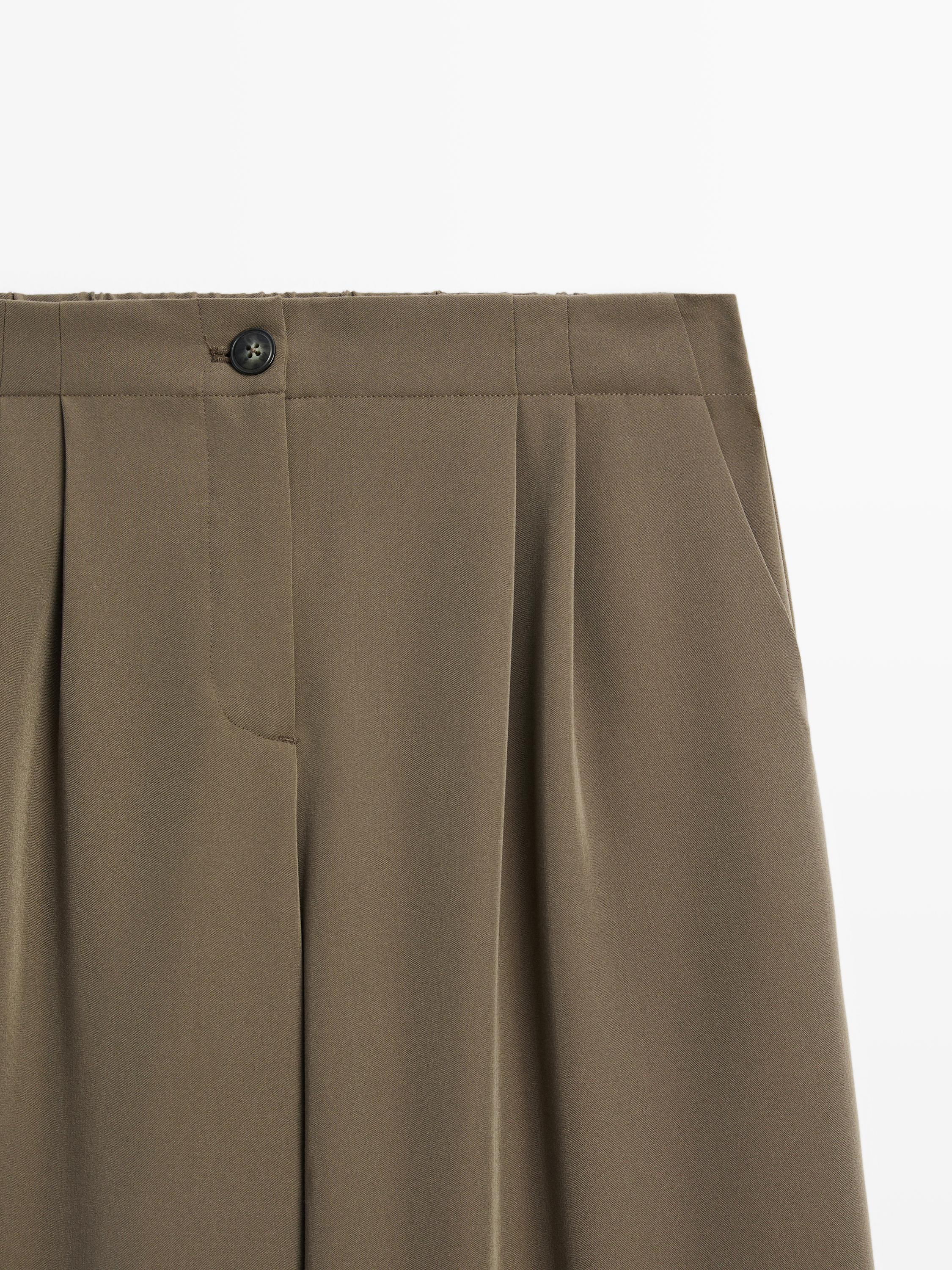 Wide-leg flowing trousers with darts