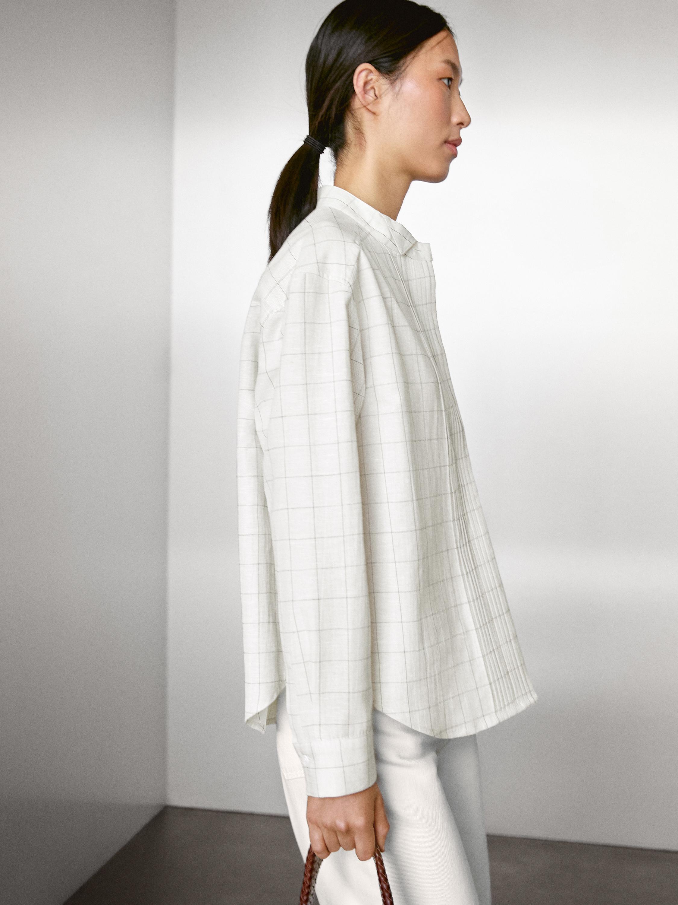 Camisa cuadros detalle jaretas