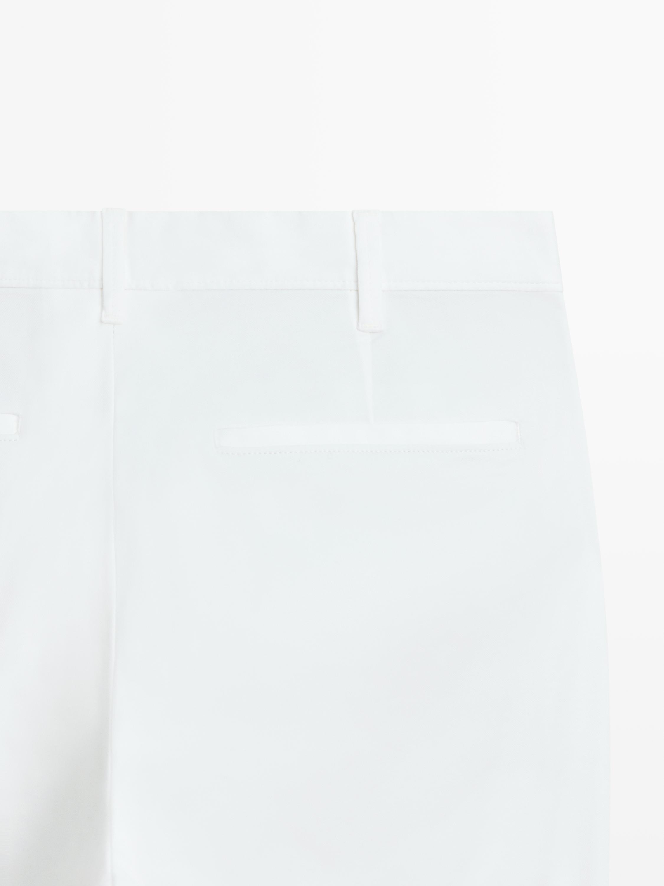 Cotton blend slim fit pants — Off white