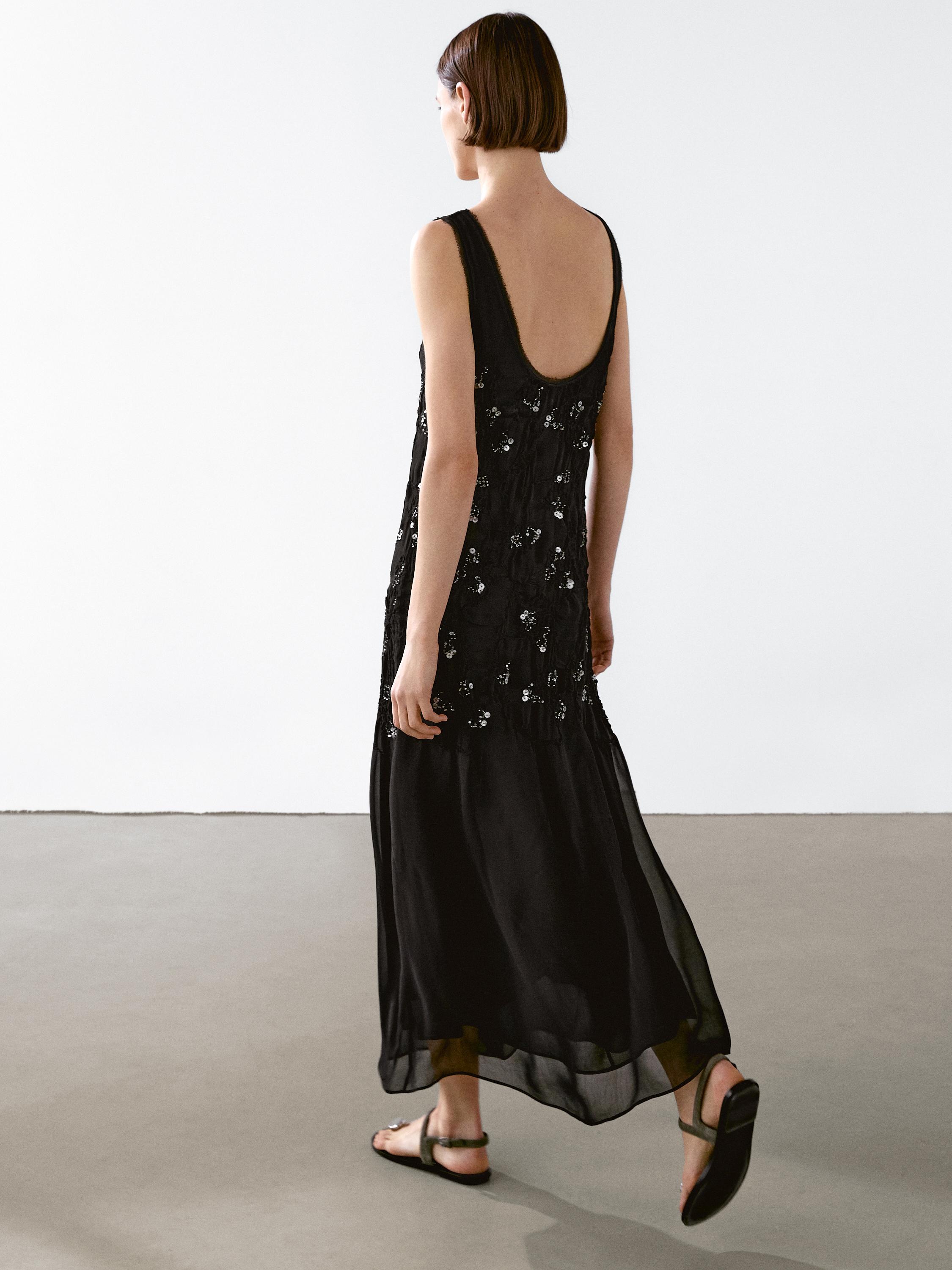 Long dress with beading