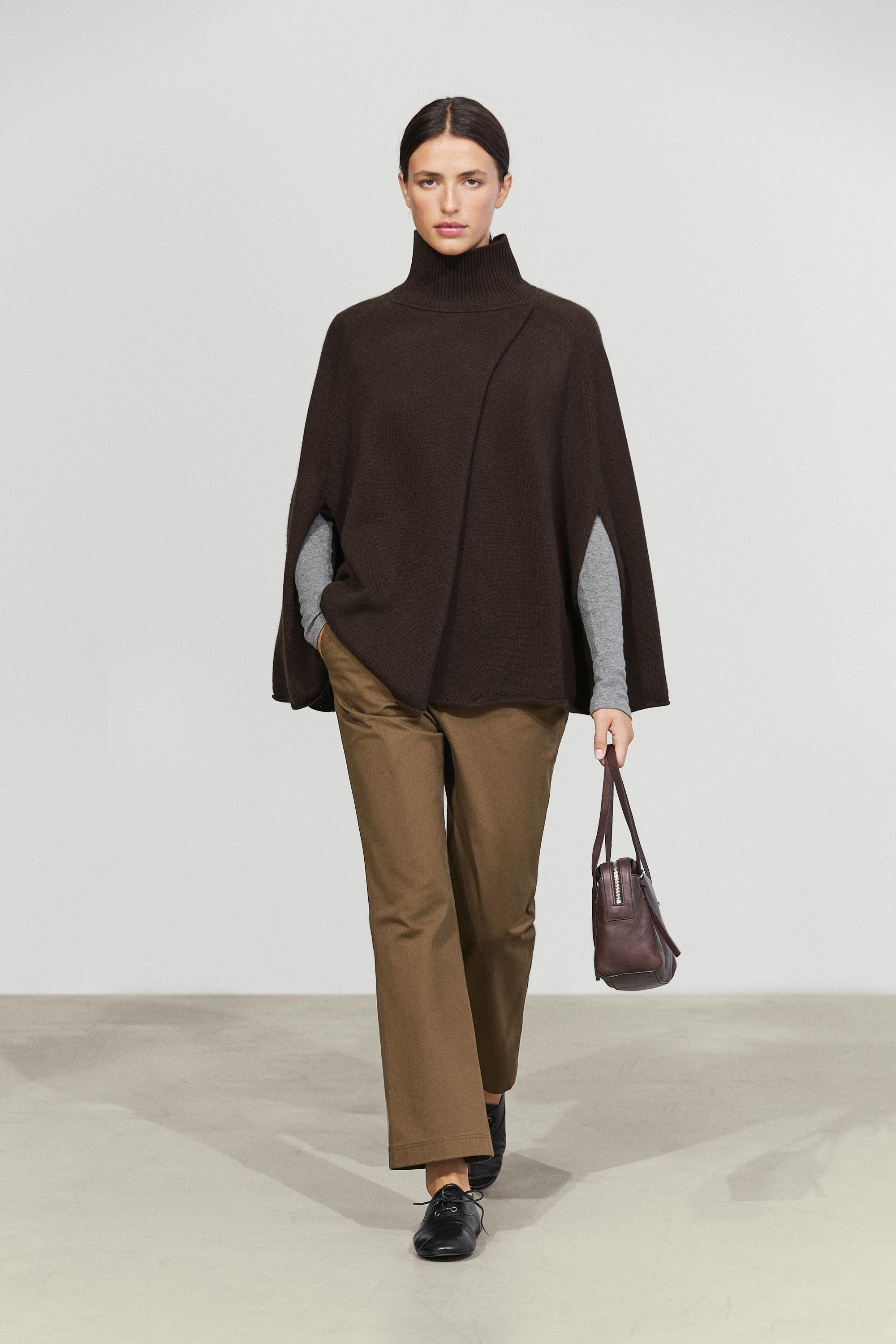 100% cashmere knit cape with crossover detail