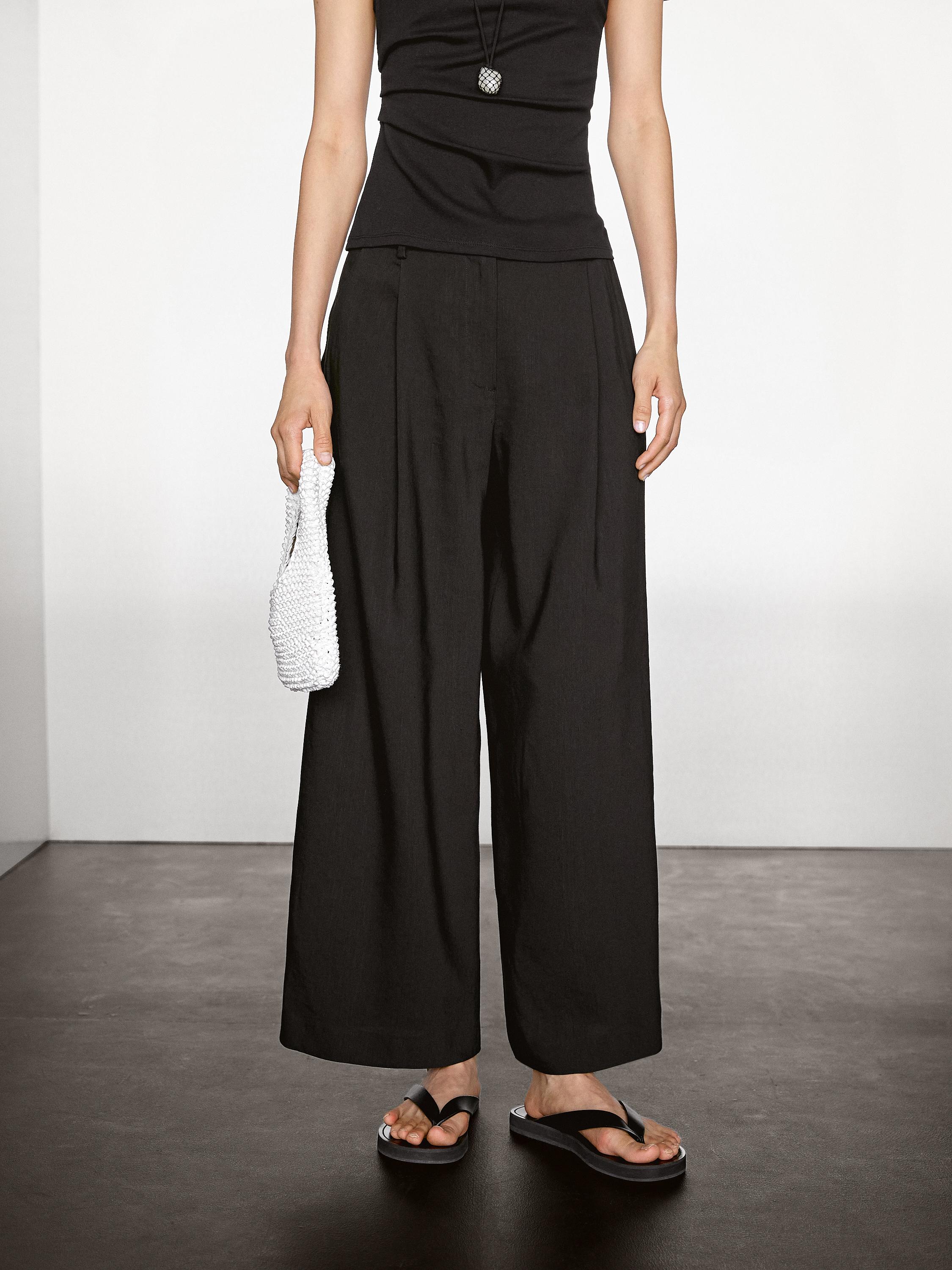 Flowing linen blend trousers with darts