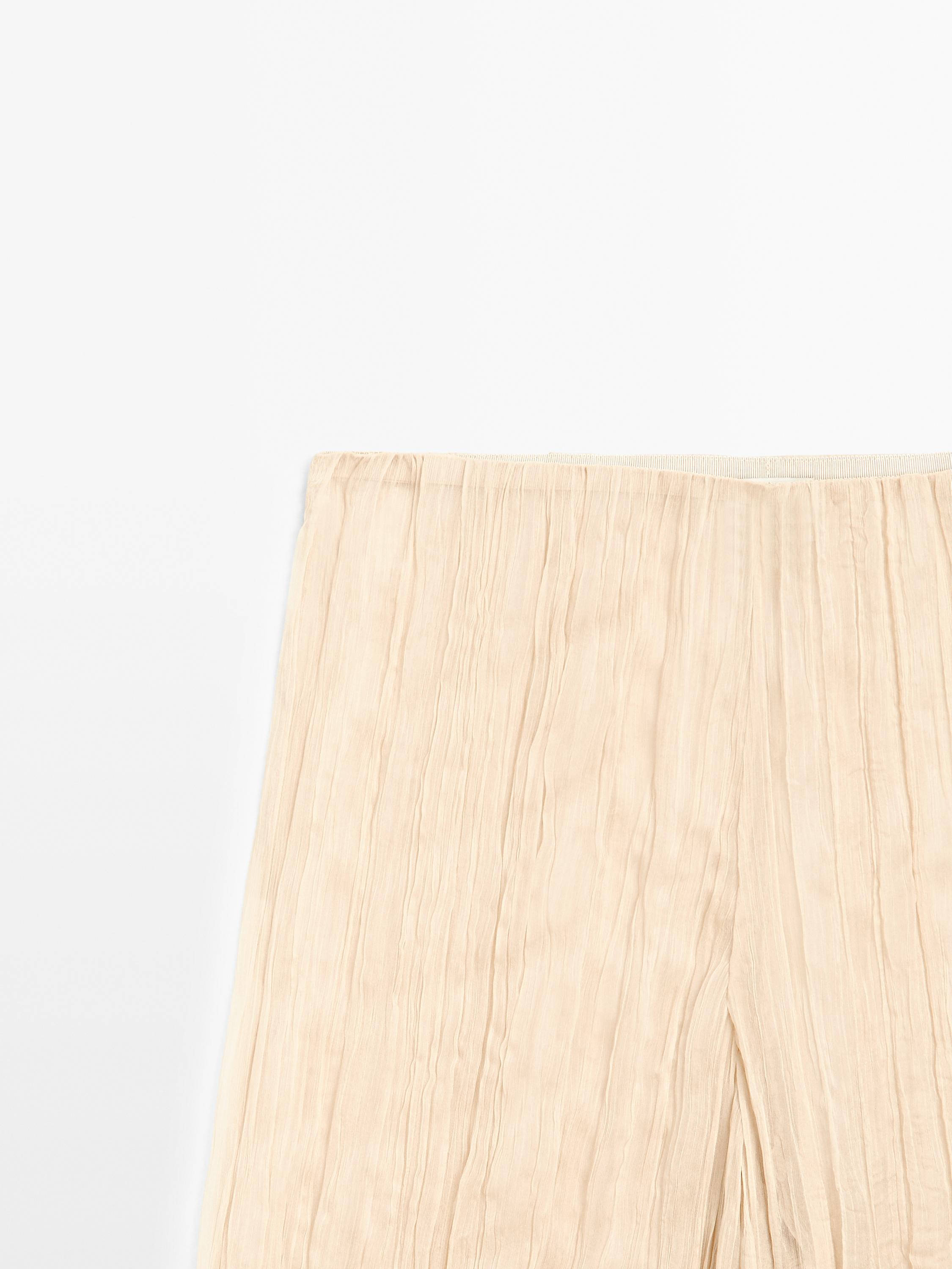 Flowing pleated trousers - Limited Edition