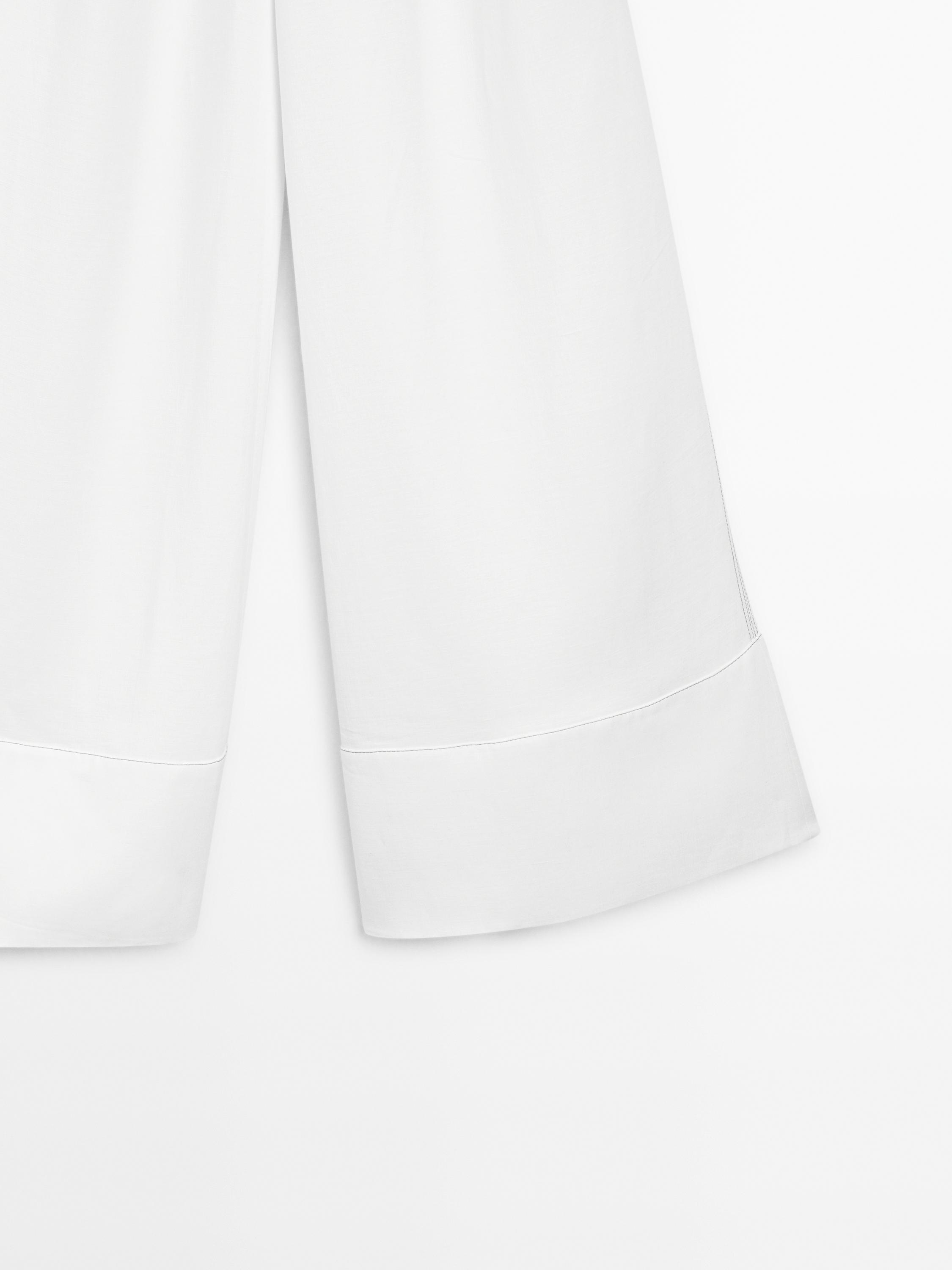 Wide-leg trousers with contrast topstitching
