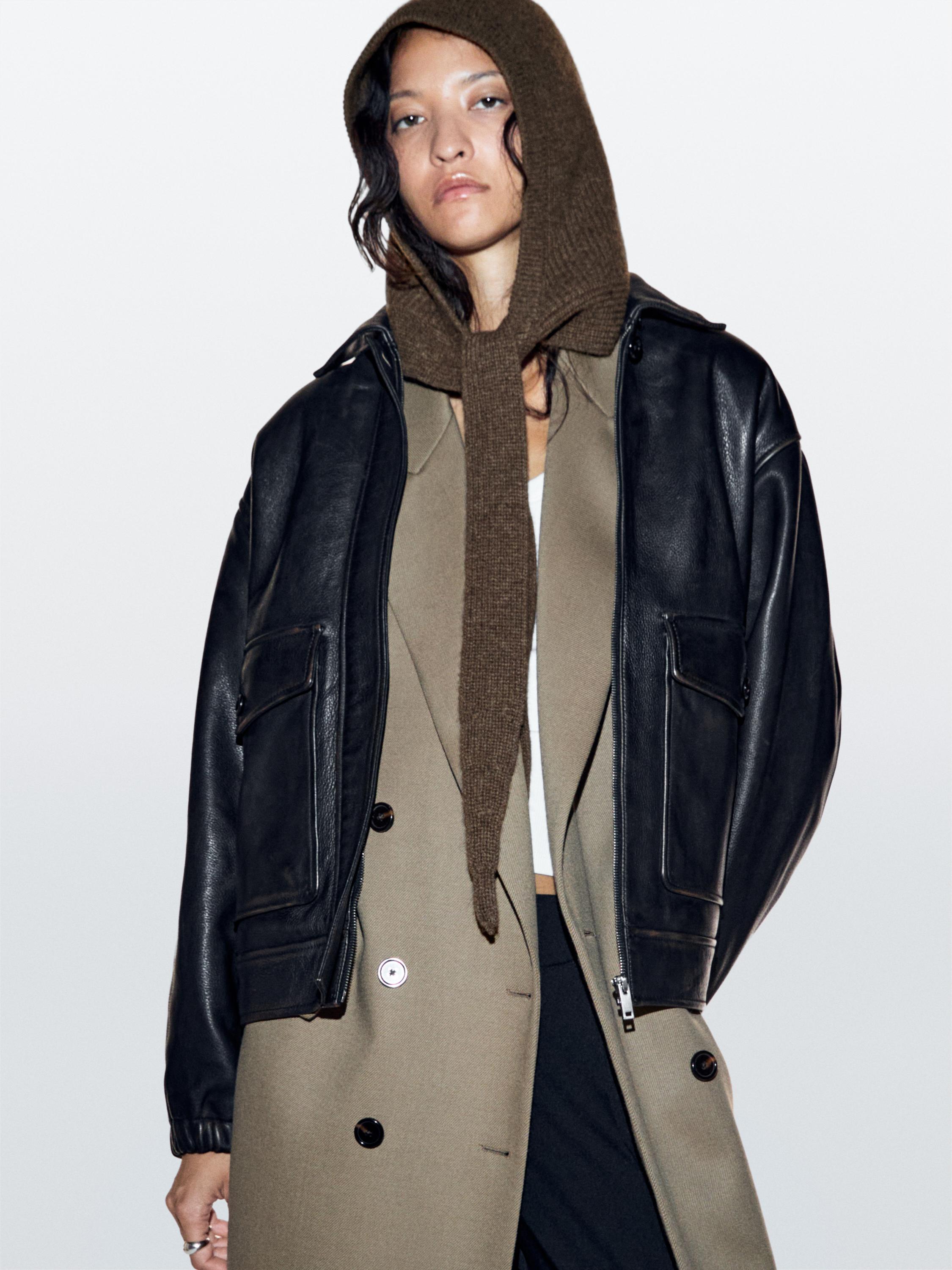 Knit hood with tie