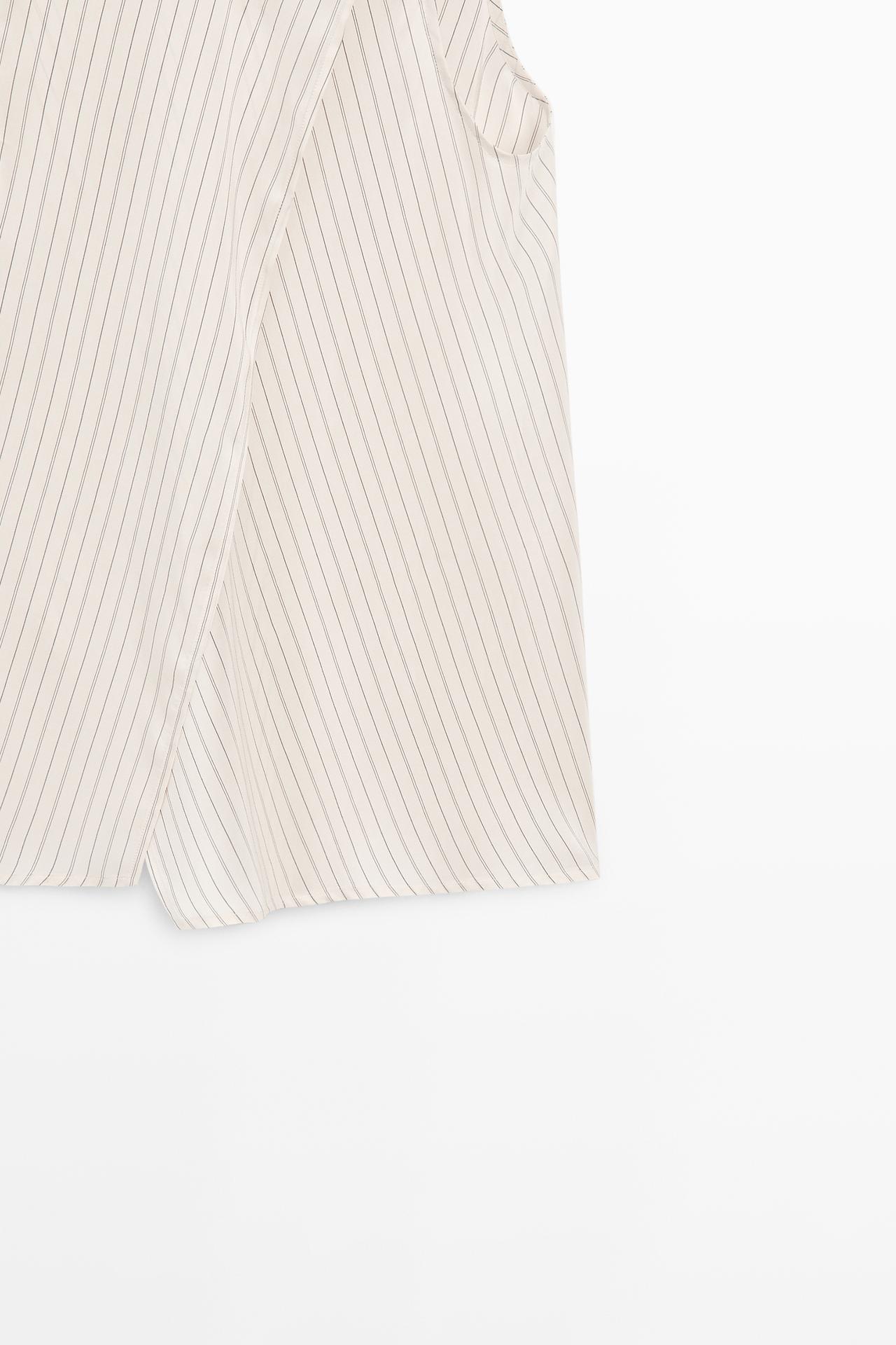 STUDIO flowing striped wrap top — CREAM