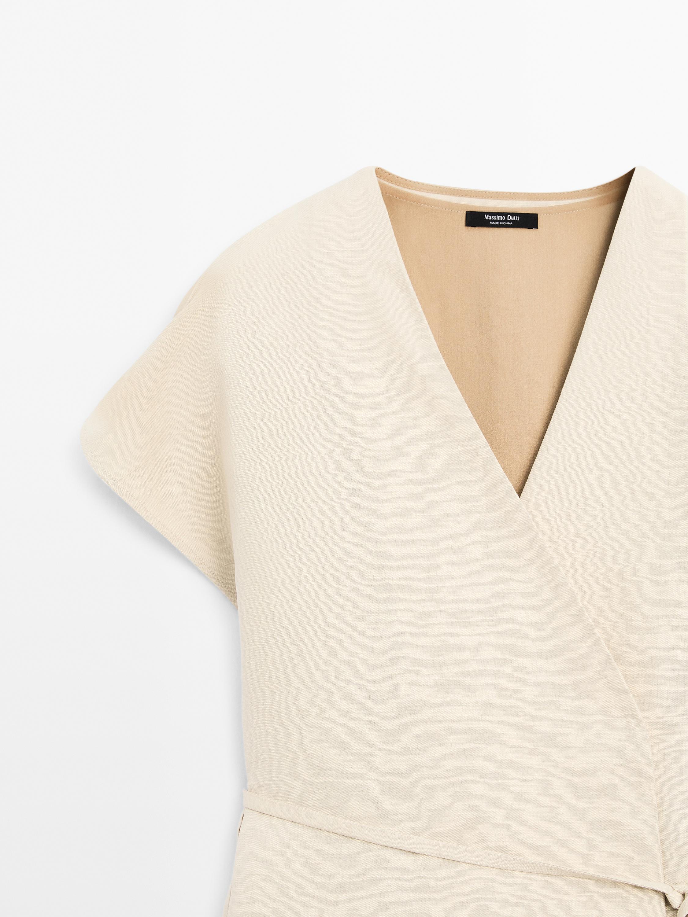 Long pleated dress with waistcoat detail