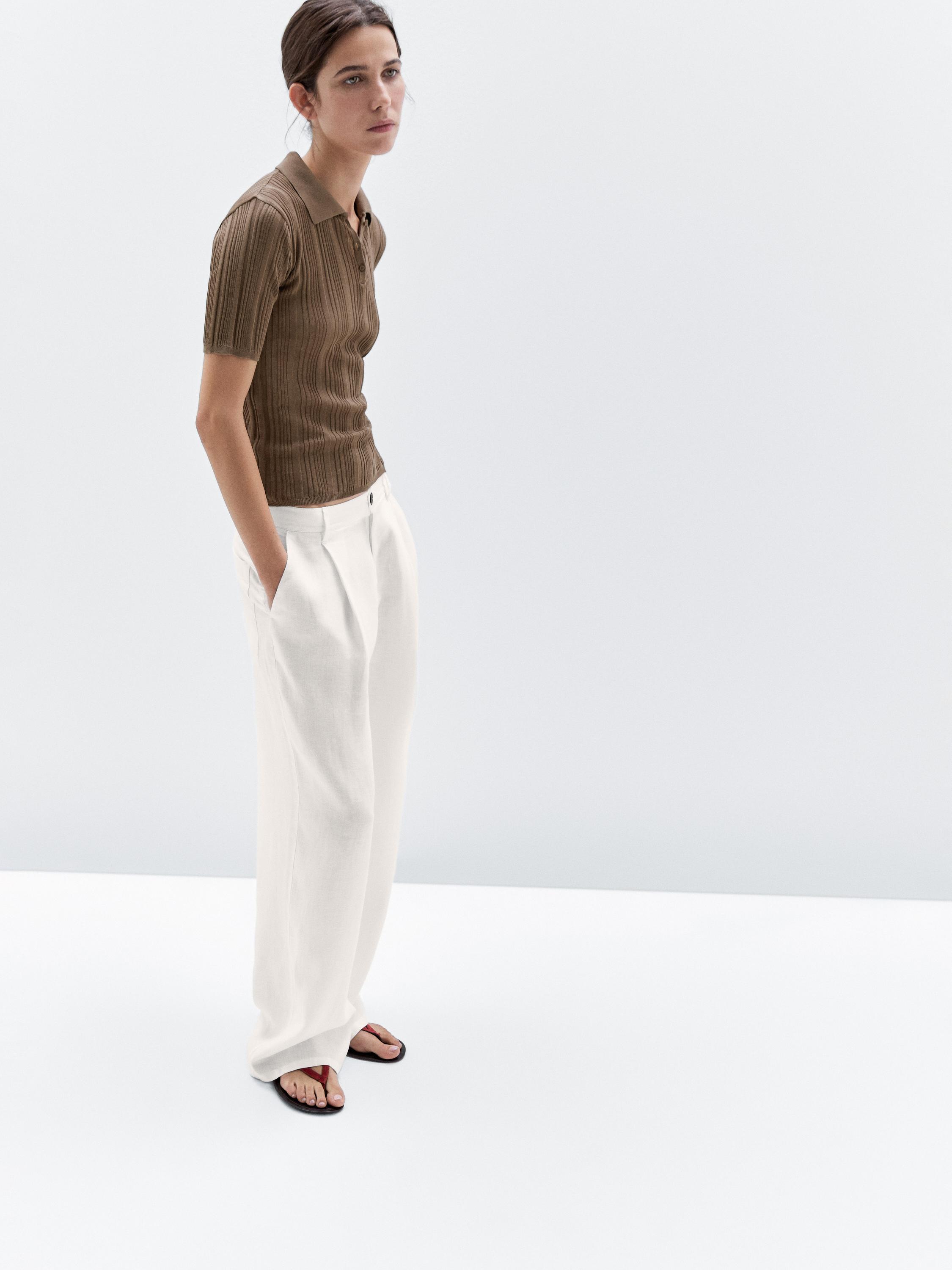 100% cotton polo shirt with ribbed detail