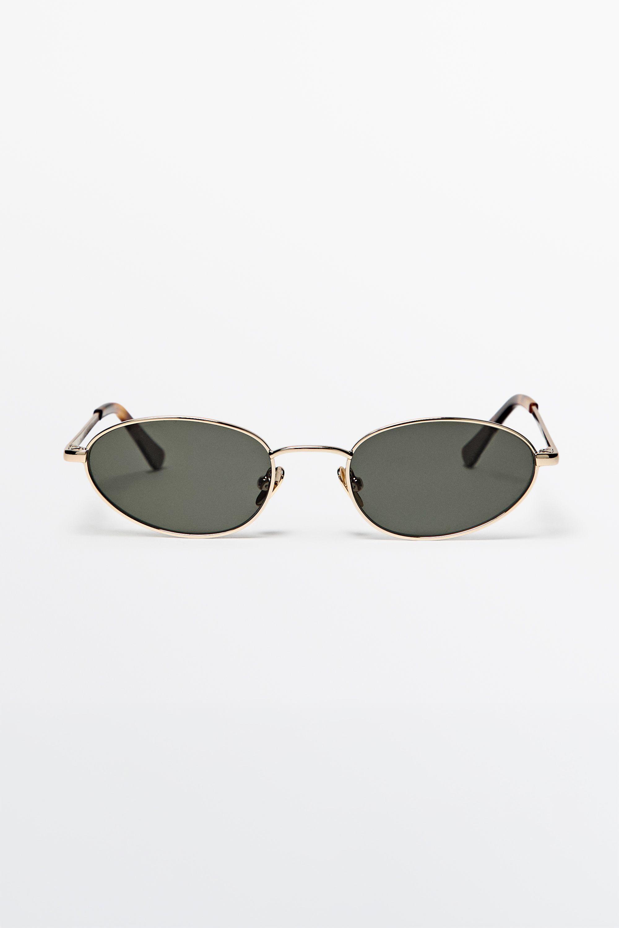 Oval metal sunglasses — GOLDEN