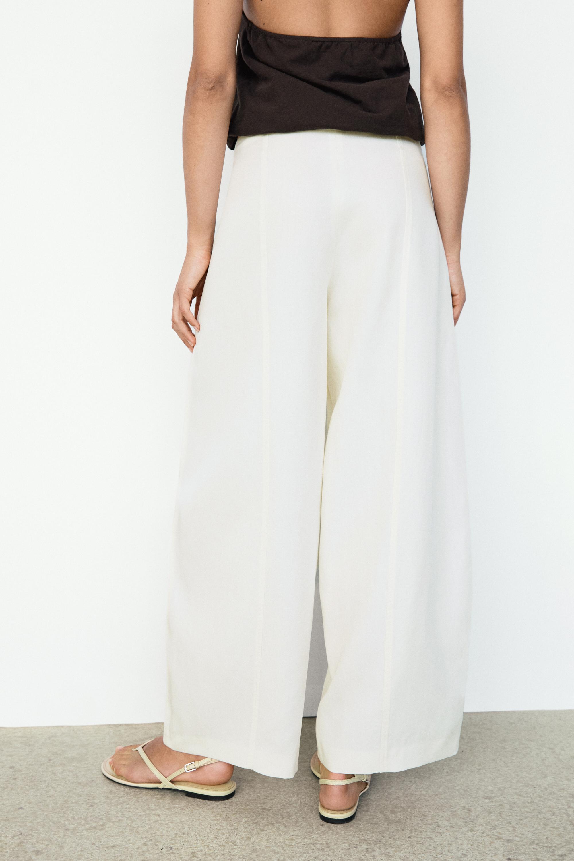 Flowing barrel fit trousers — OFF WHITE