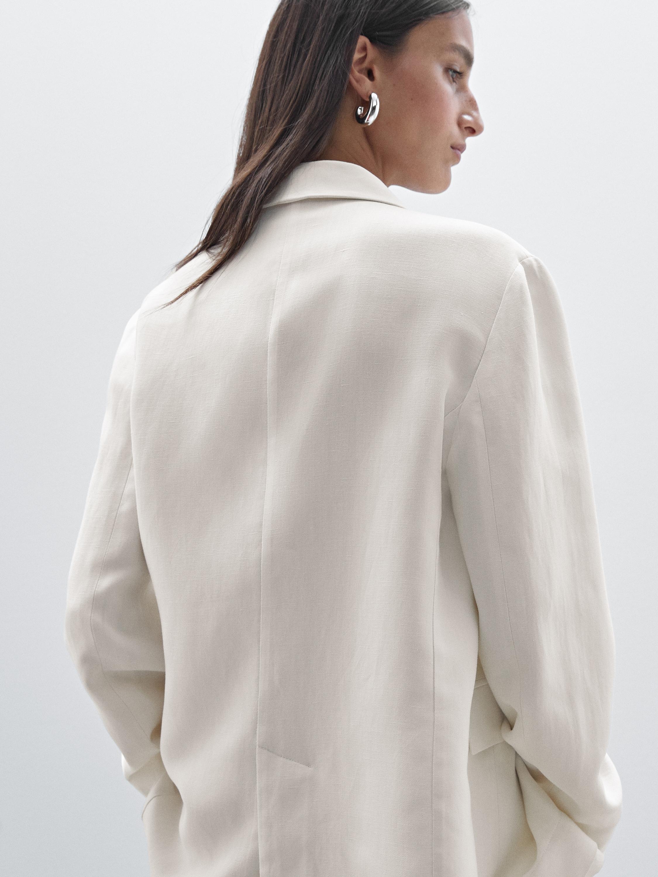 Suit blazer with tie detail in contrast fabric