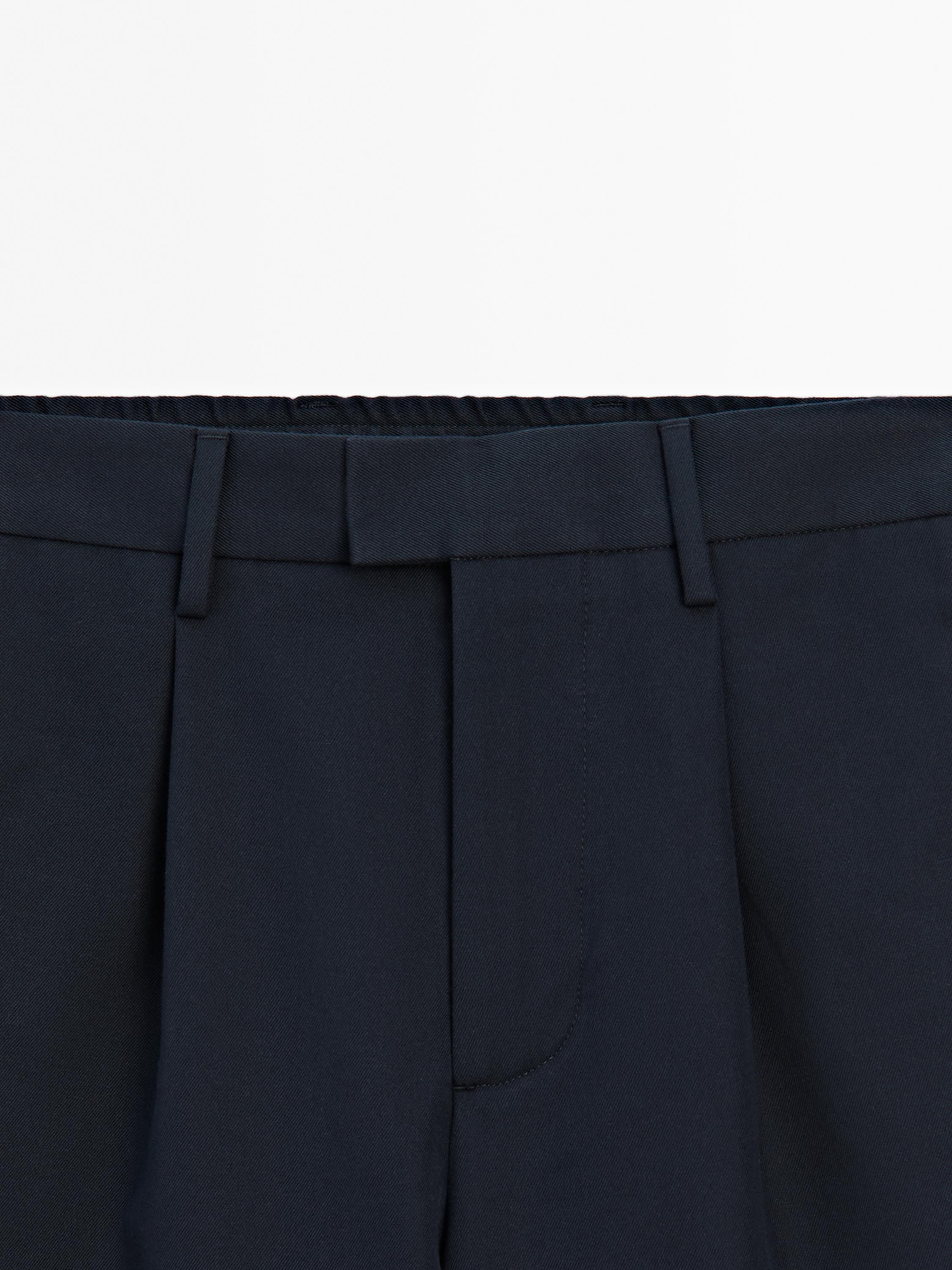 Wool blend trousers with darts