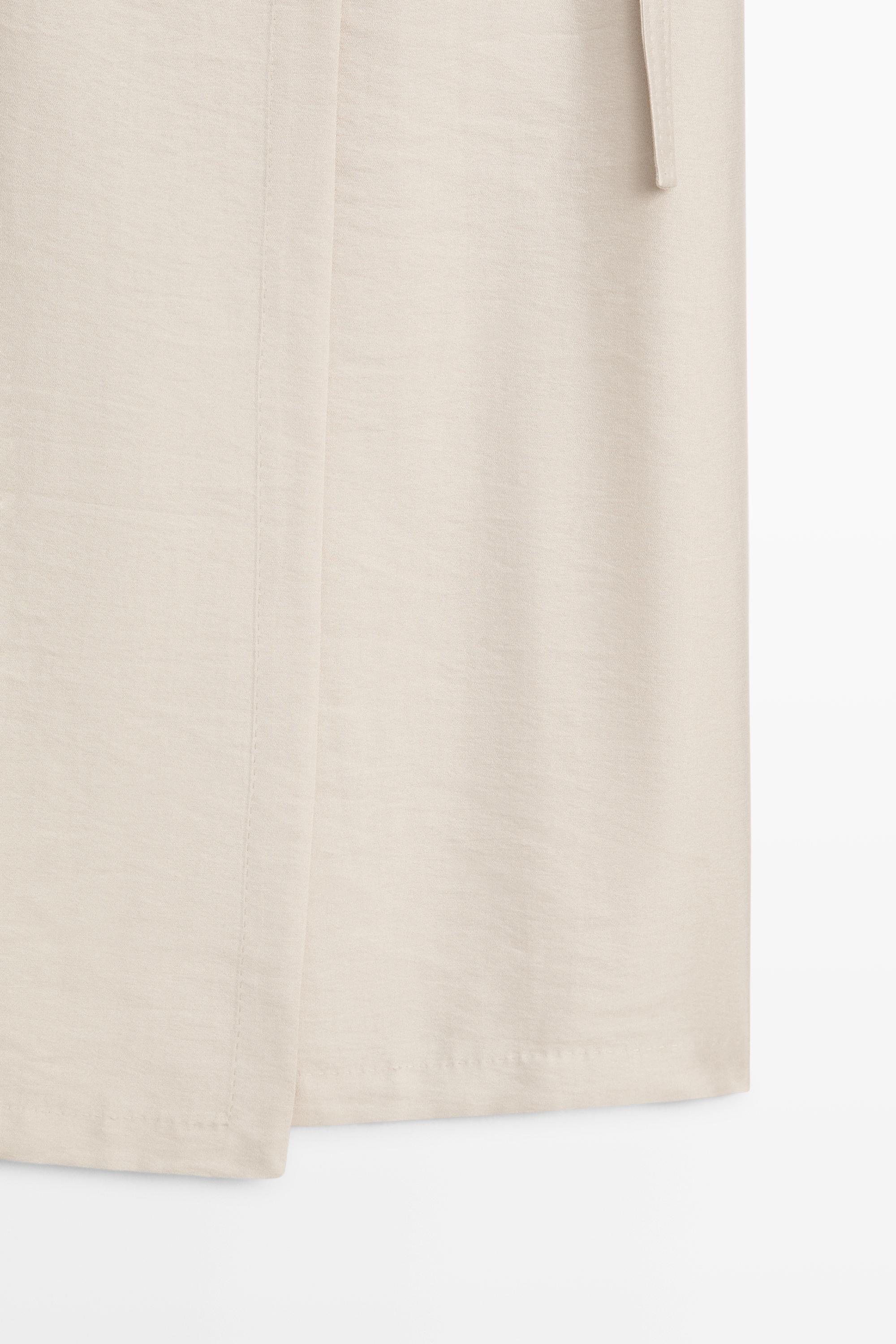 Fluid pocket-detail skirt - STUDIO — STONE