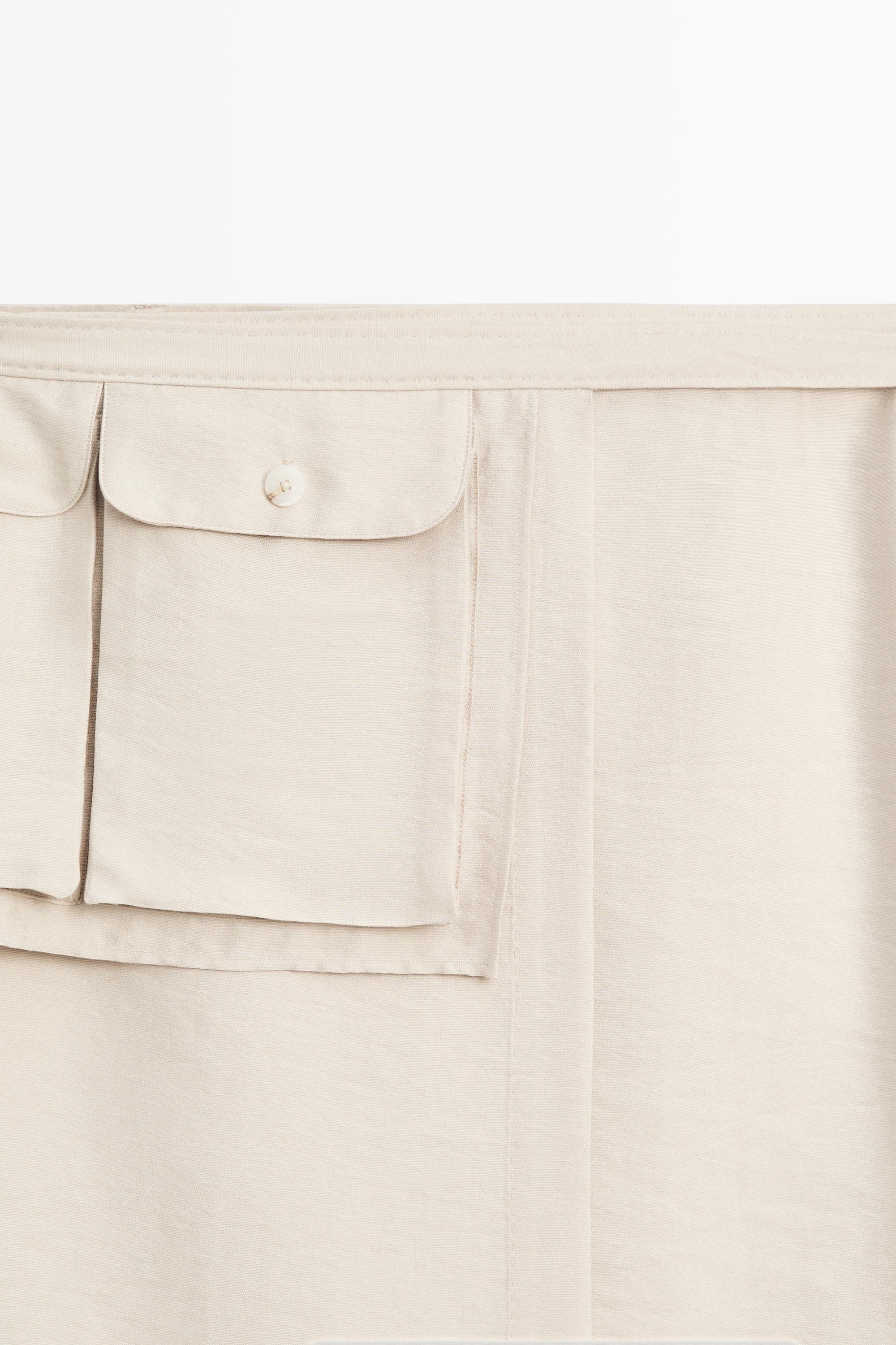 Fluid pocket-detail skirt - STUDIO — STONE